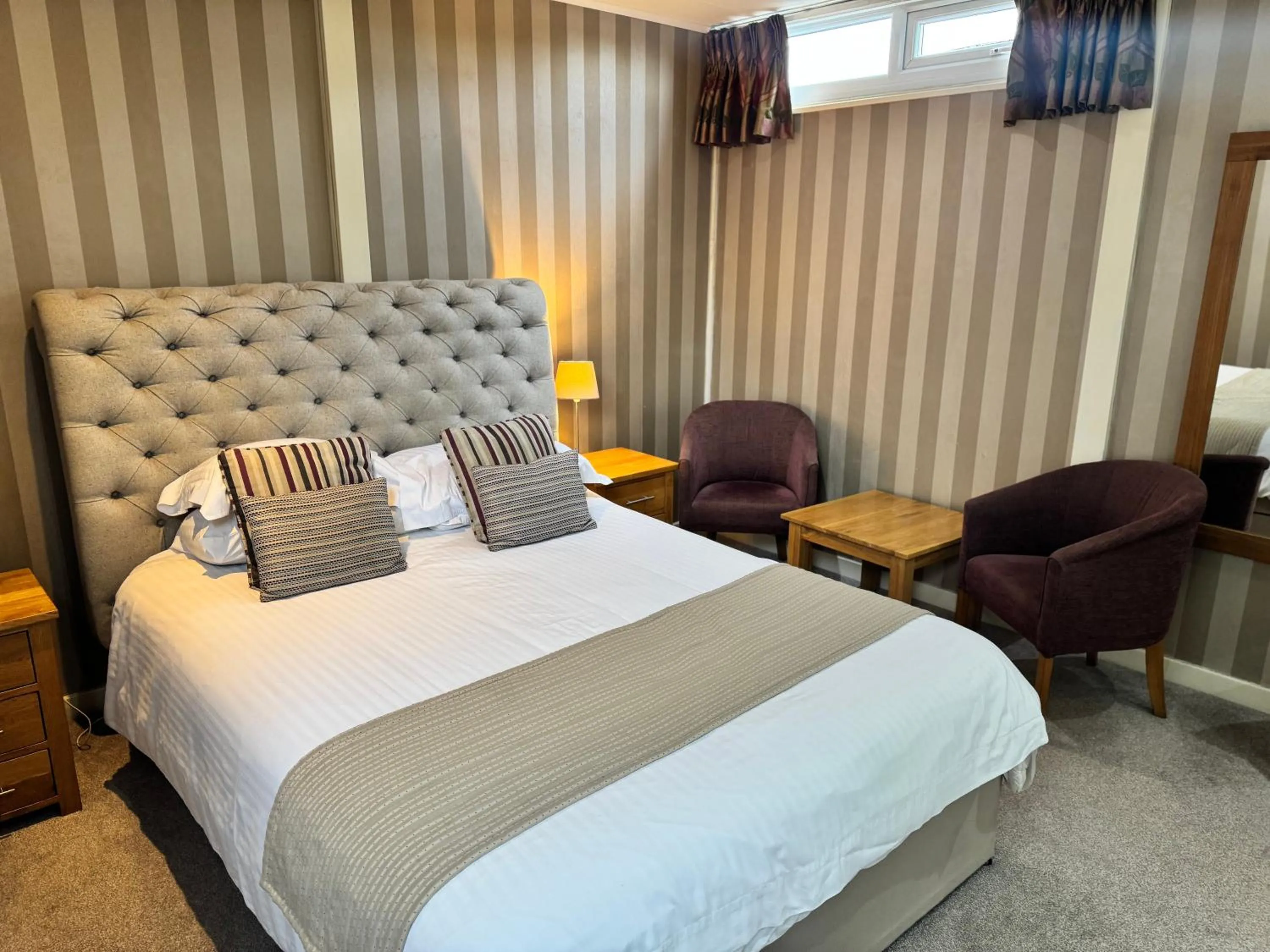 Bed in The Dog & Partridge Country Inn