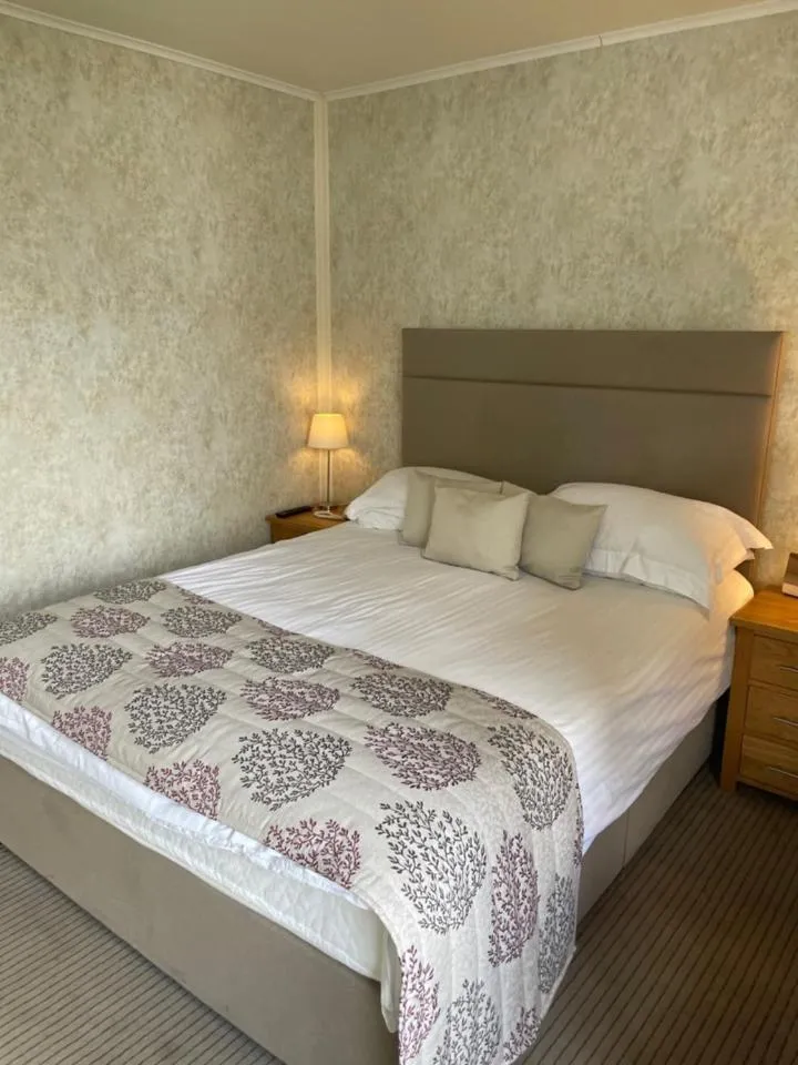 Bed in The Dog & Partridge Country Inn