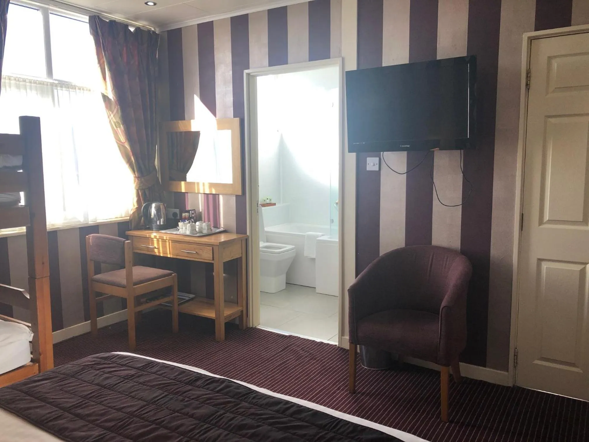 Bed in The Dog & Partridge Country Inn