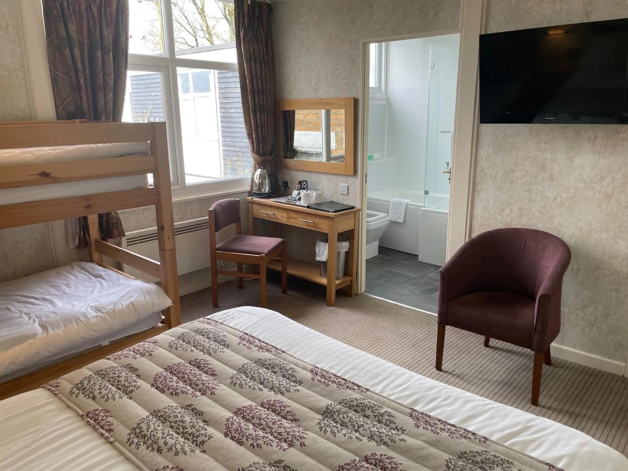 Bed in The Dog & Partridge Country Inn