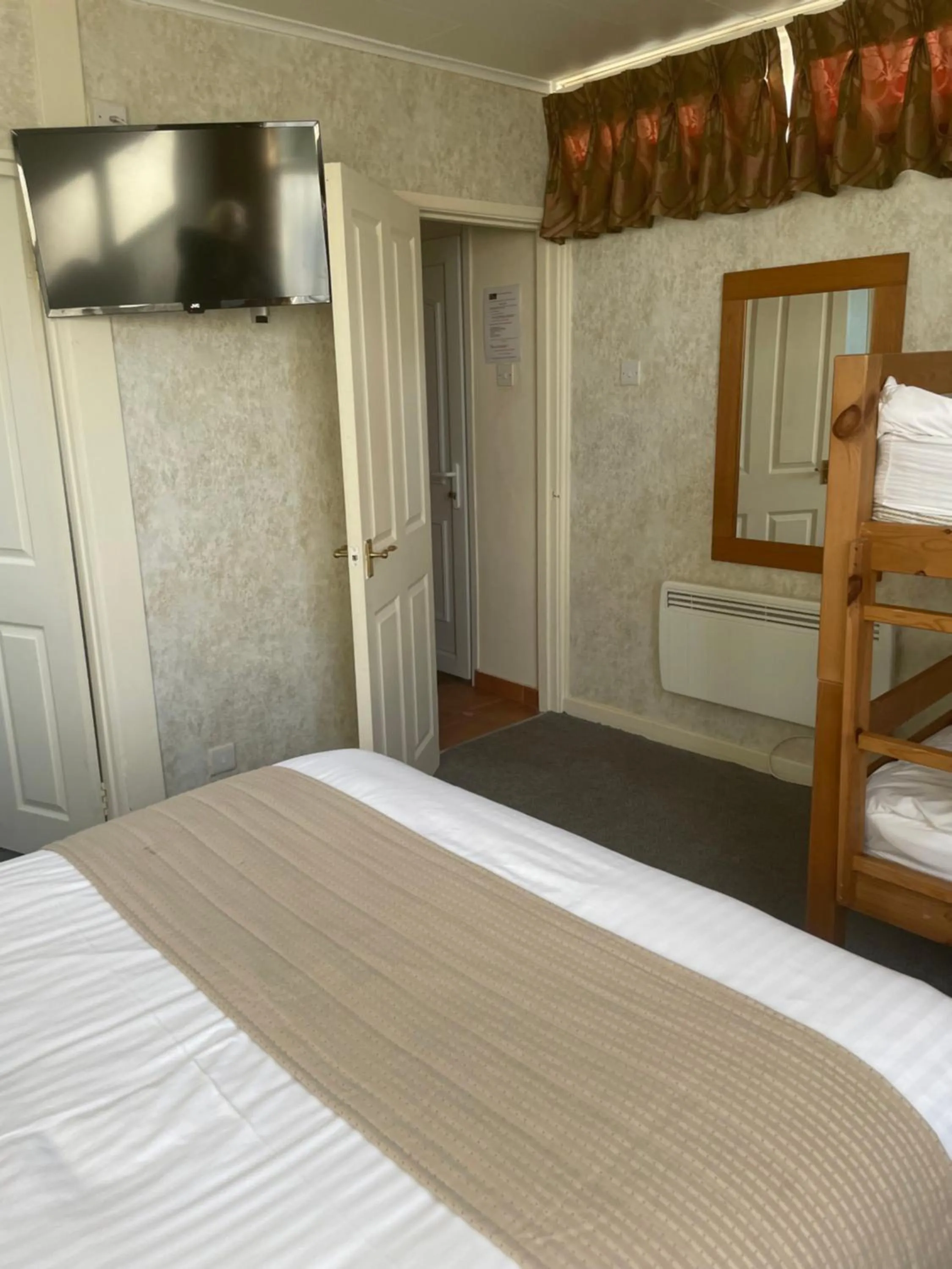 Bed in The Dog & Partridge Country Inn