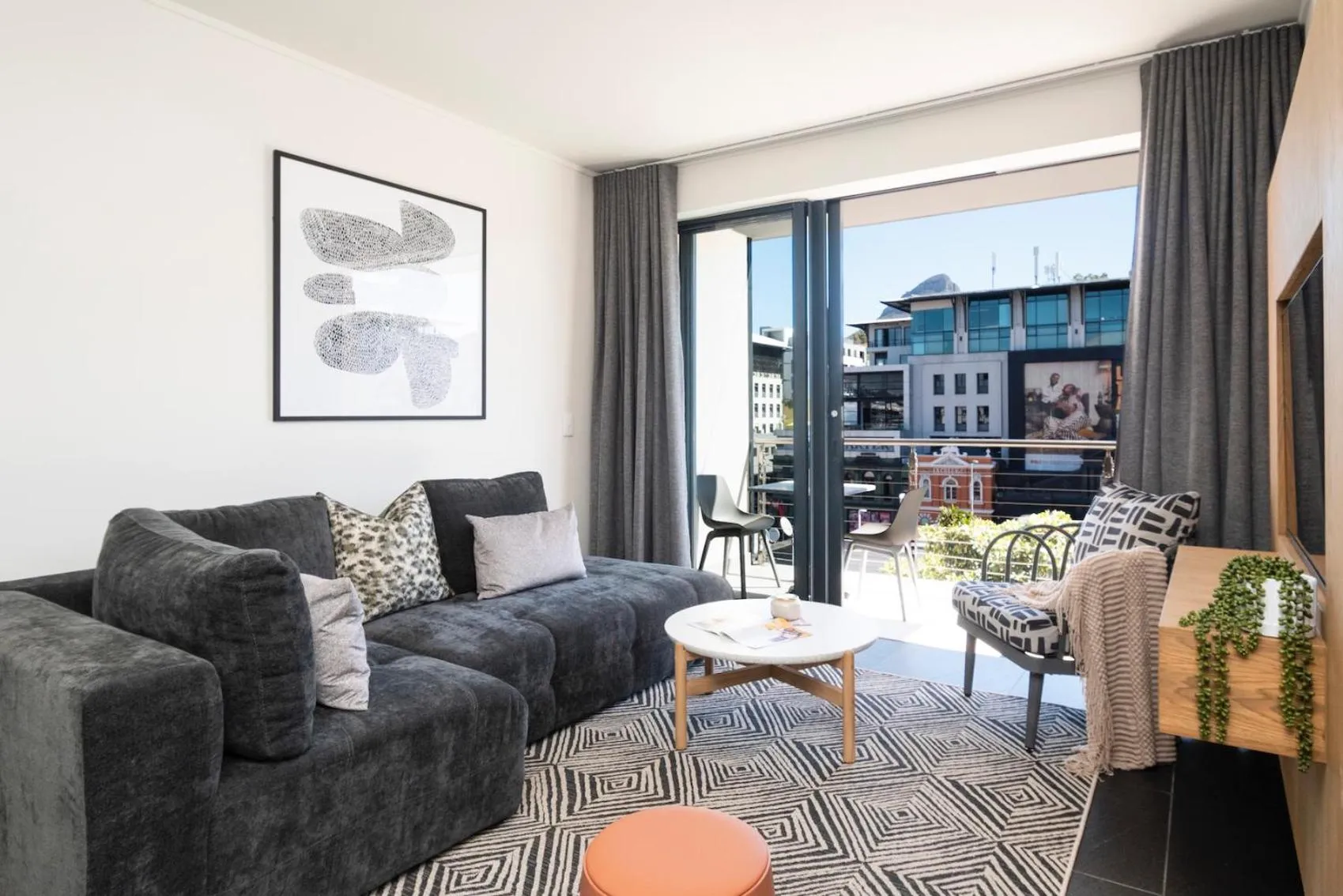 Living room in Xenia Aparthotel by Totalstay