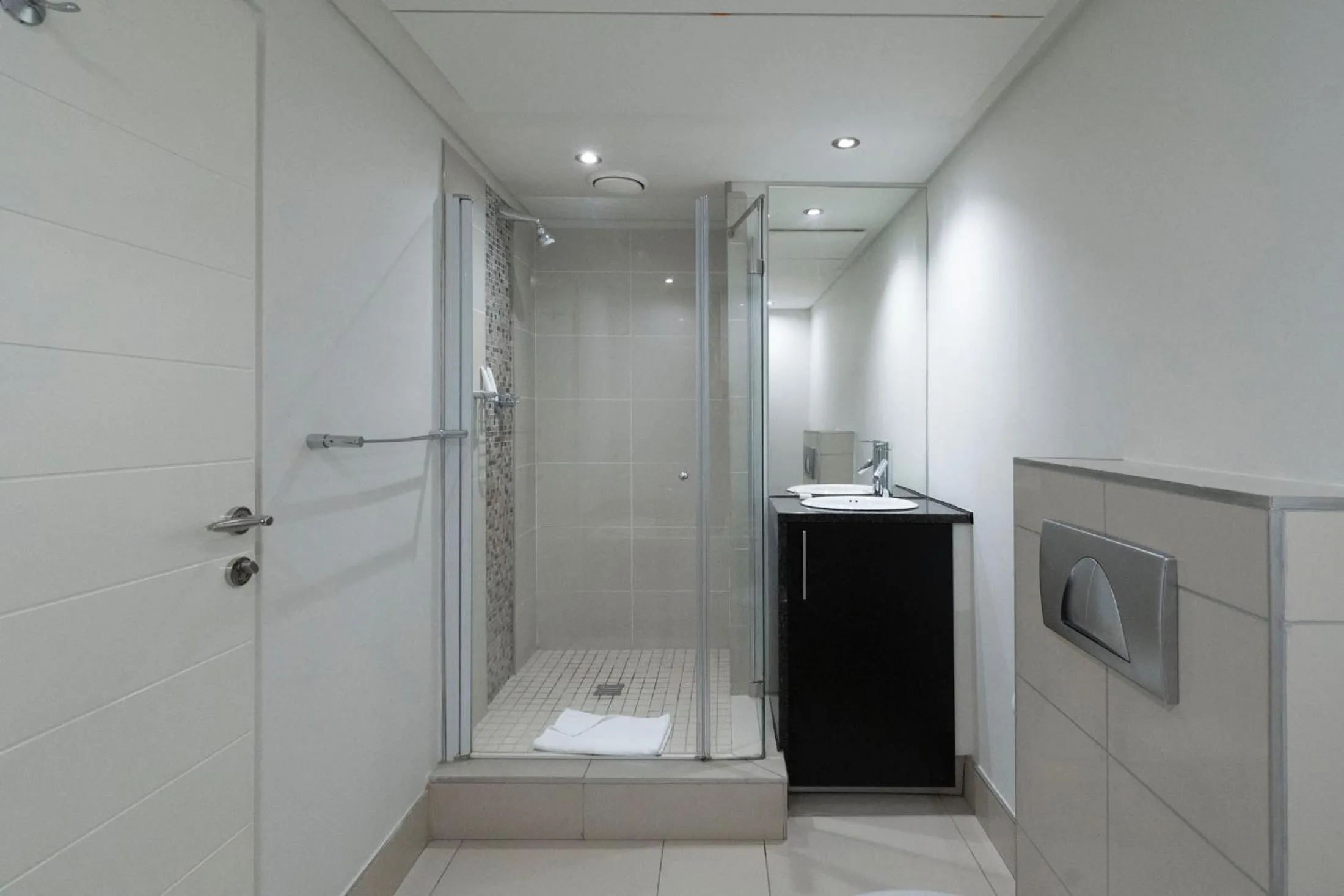 Shower in Xenia Aparthotel by Totalstay