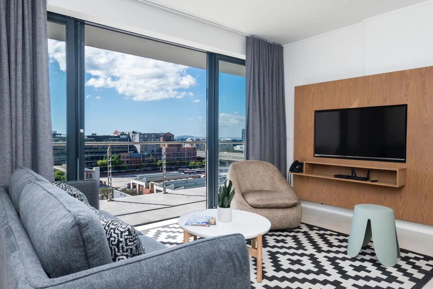 Living room in Xenia Aparthotel by Totalstay