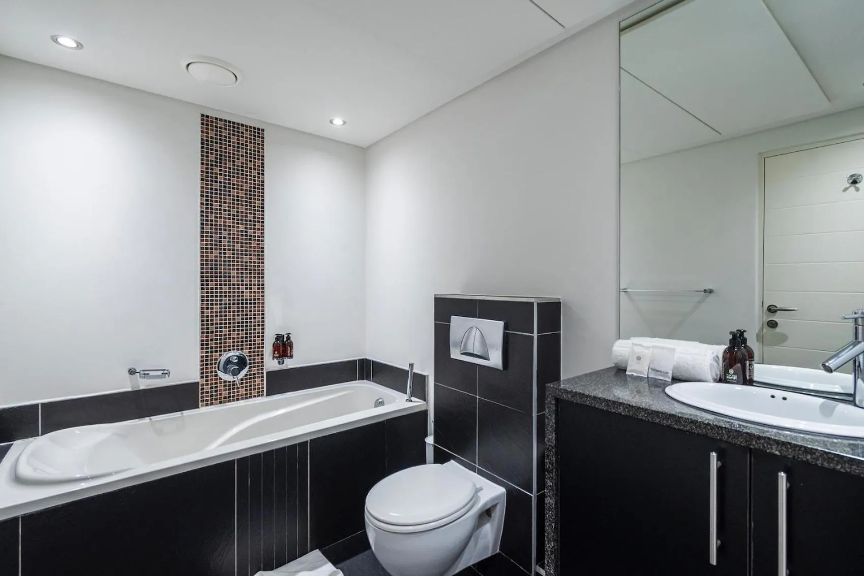 Bathroom in Xenia Aparthotel by Totalstay