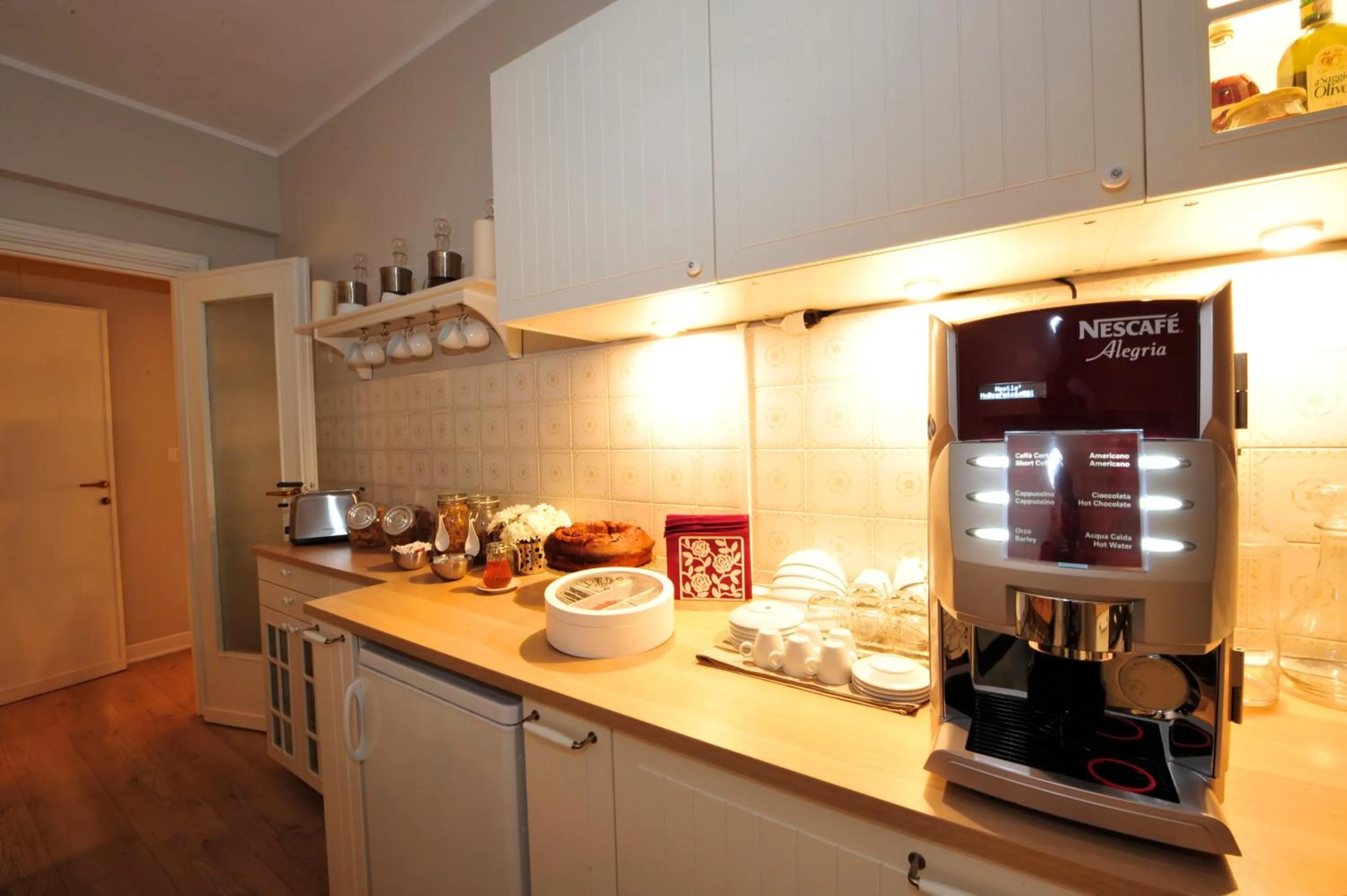 Communal kitchen in Vatican Holiday Home