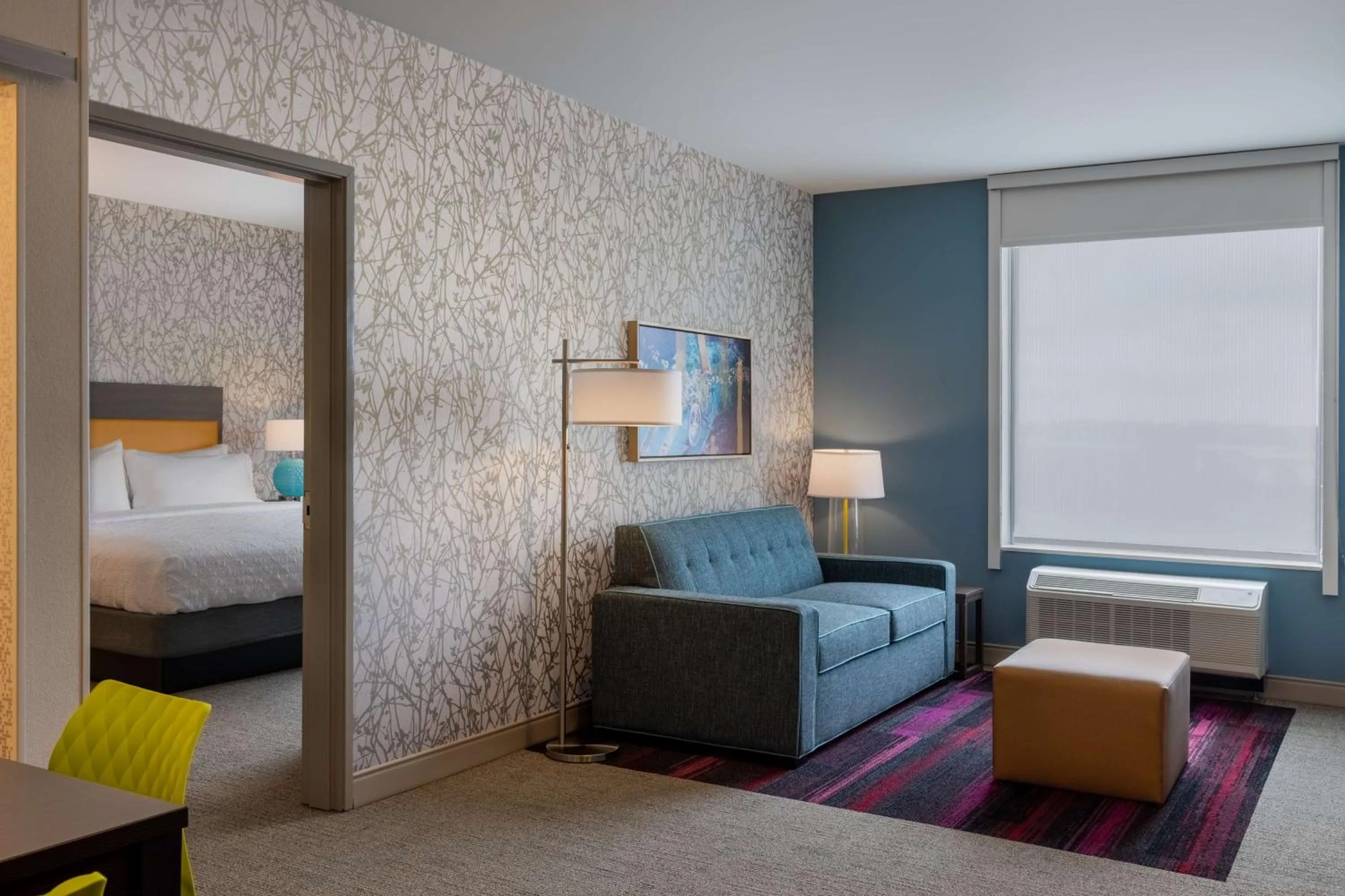 Living room, Bed in Home2 Suites By Hilton Ankeny