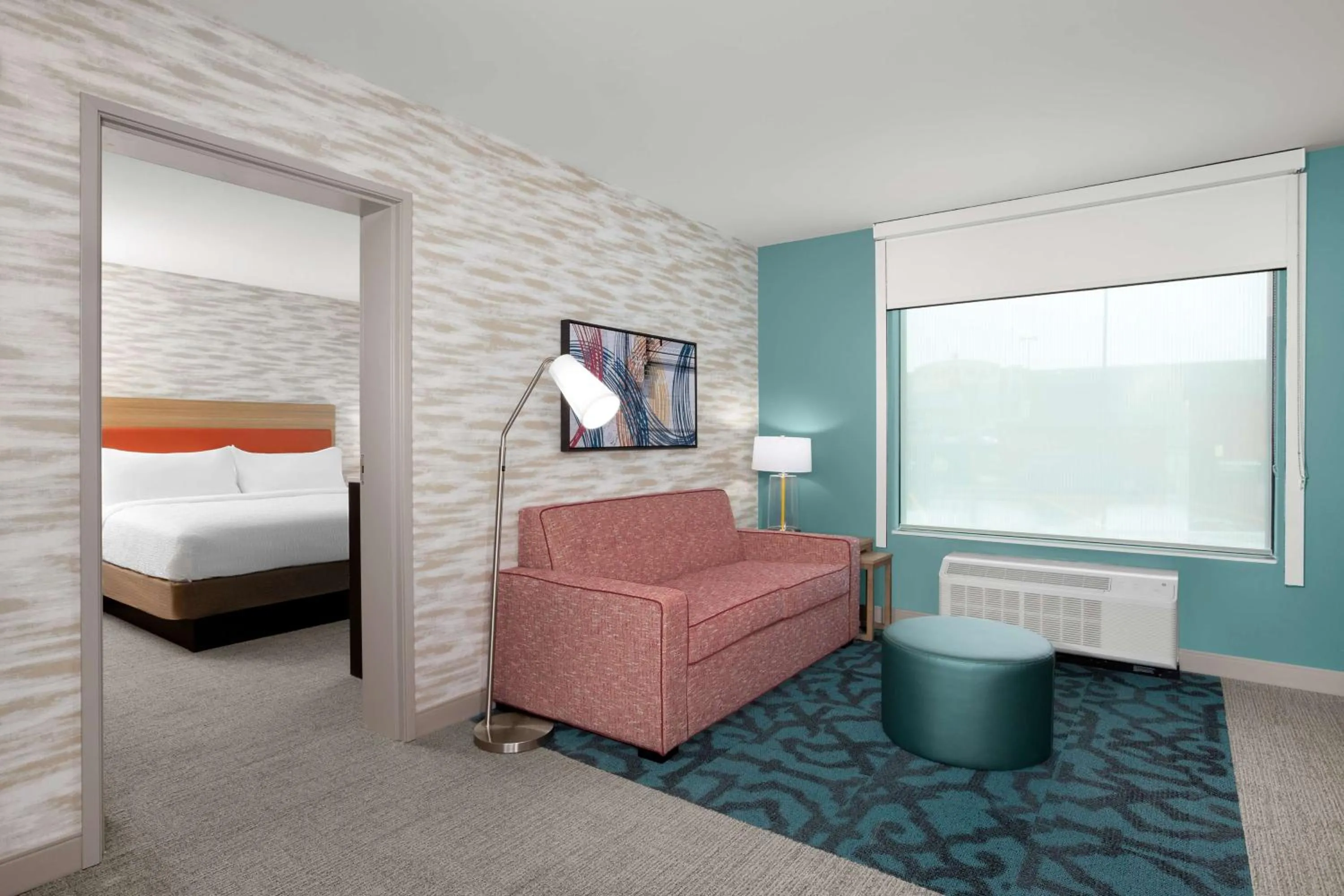 Living room, Bed in Home2 Suites By Hilton Owatonna