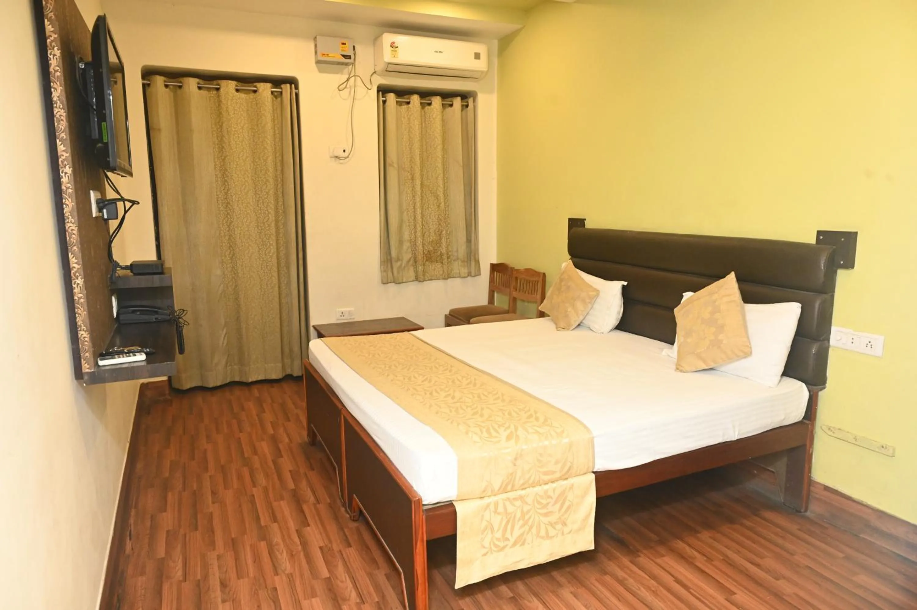 Bed in Hotel Gokul Grand