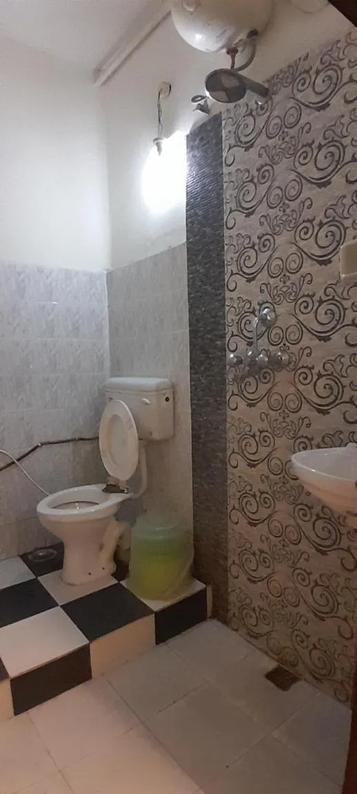 Toilet in Hotel Gokul Grand