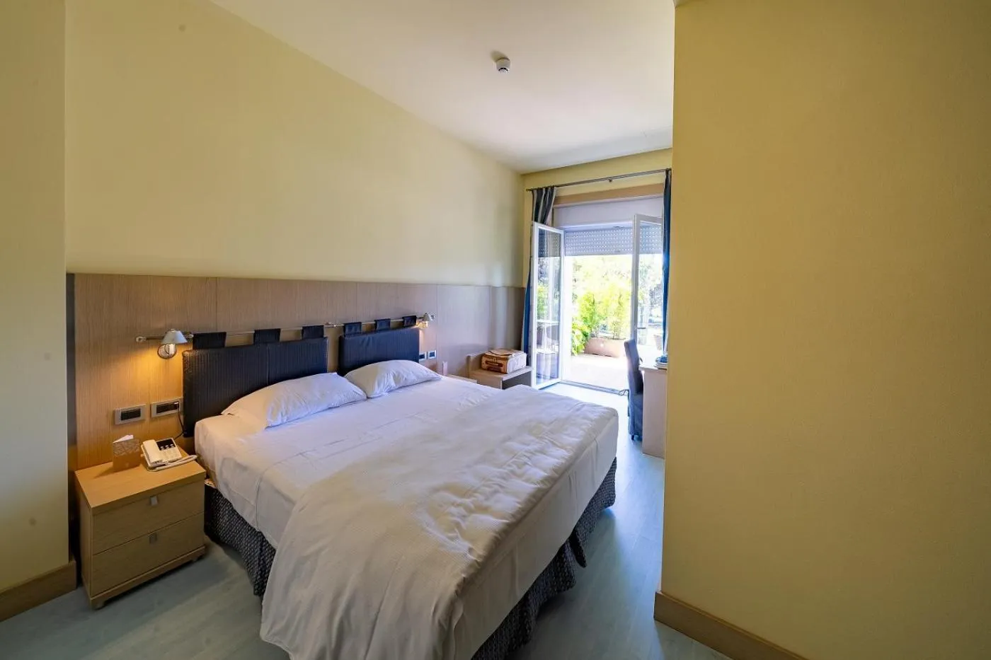 Bed in Il Tridente Hotel