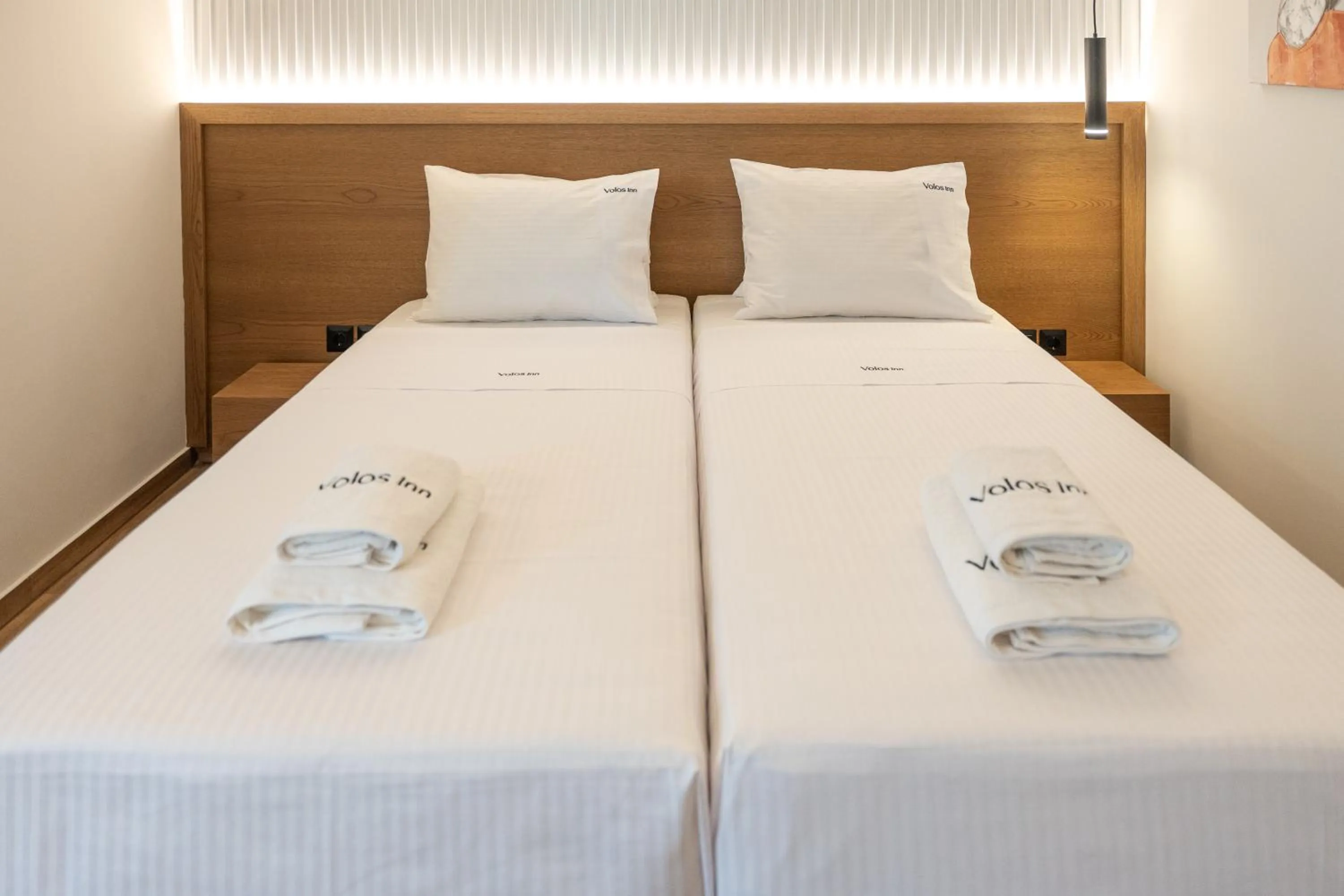 Bed in Volos Inn Hotel