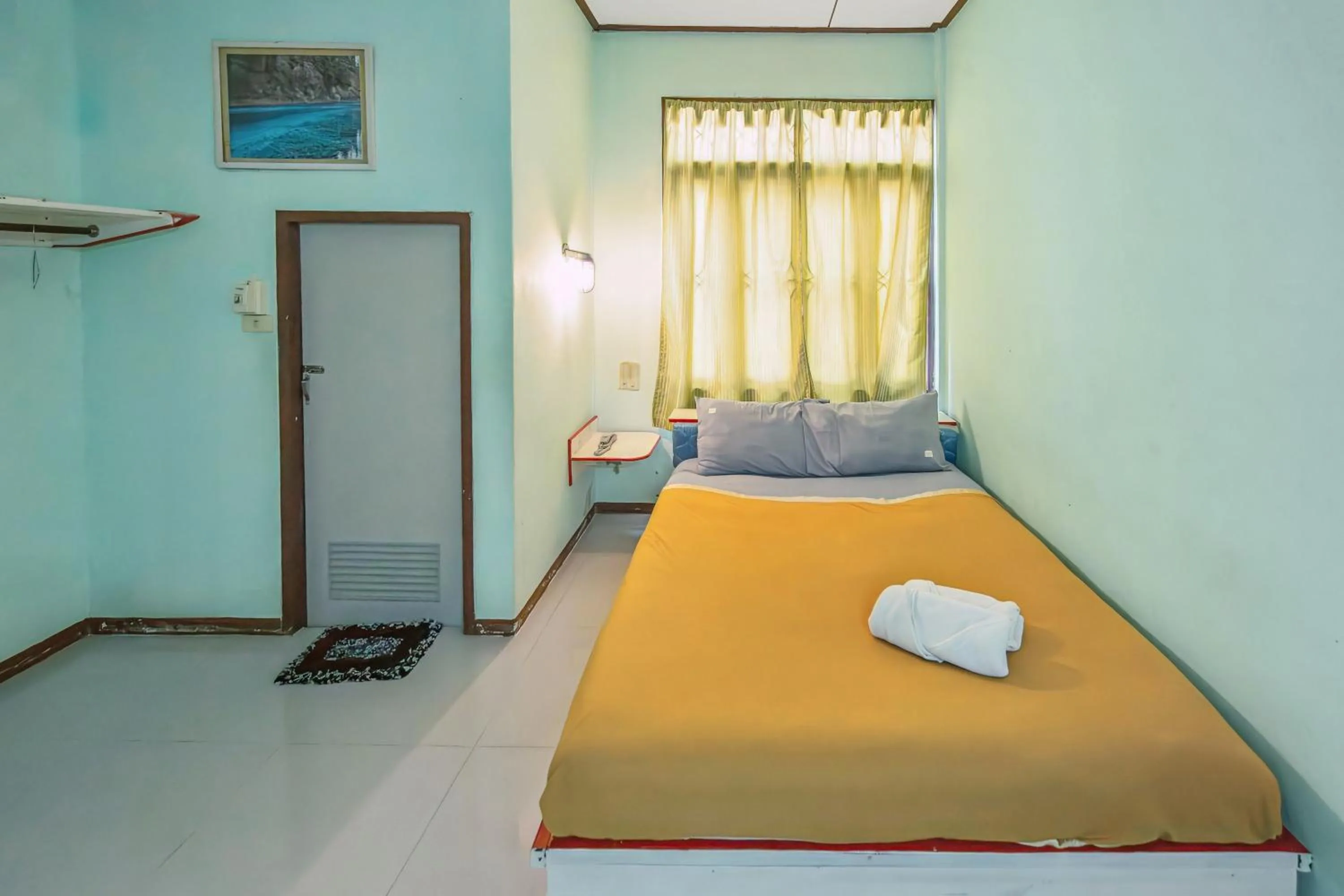 Bed in The Prince Hotel