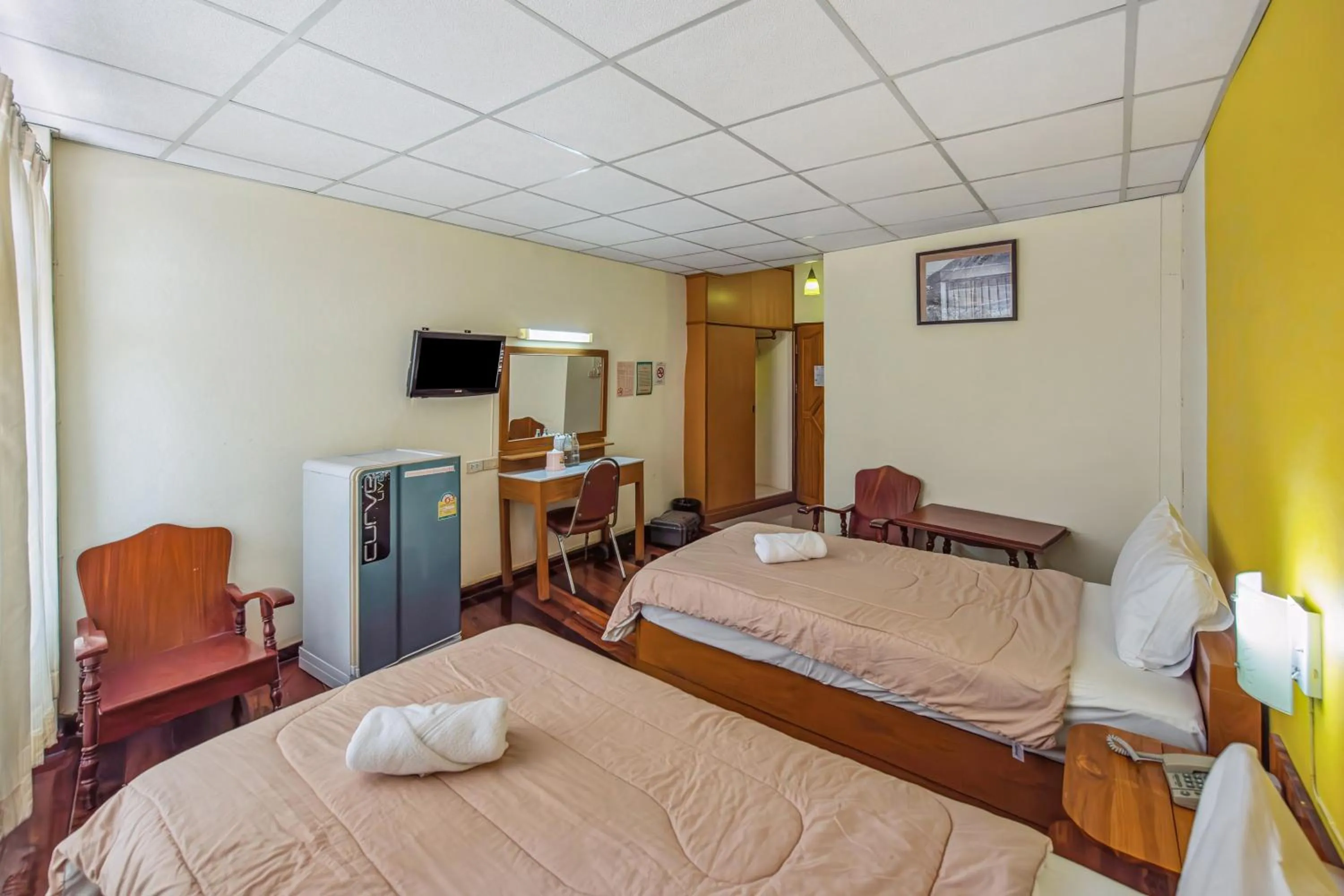 Bed in The Prince Hotel