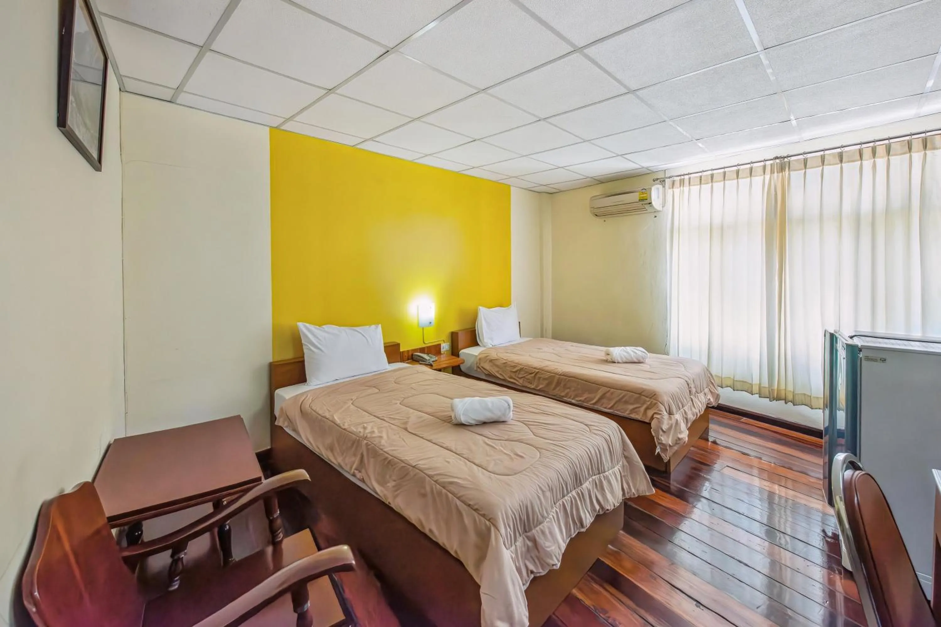 Bed in The Prince Hotel