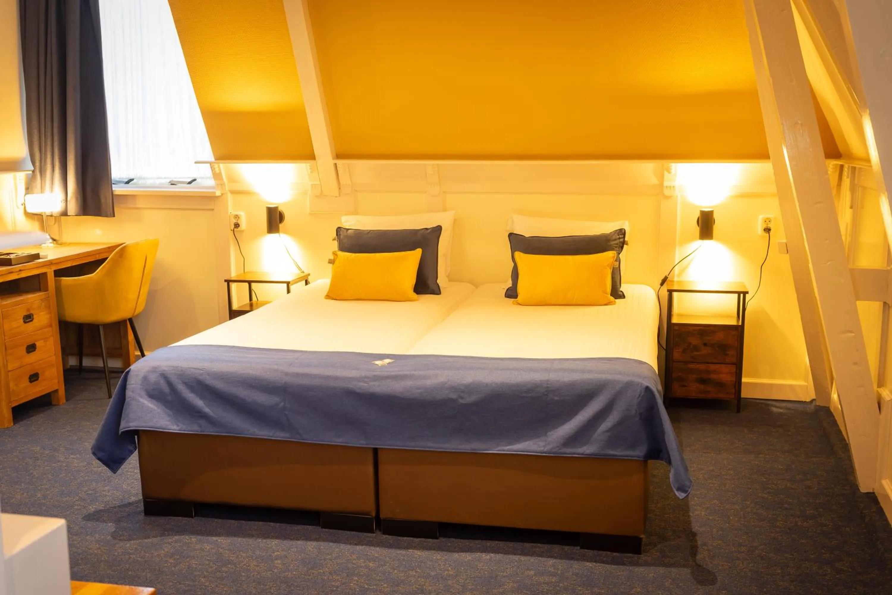 Bed in Hotel de Gulden Leeuw