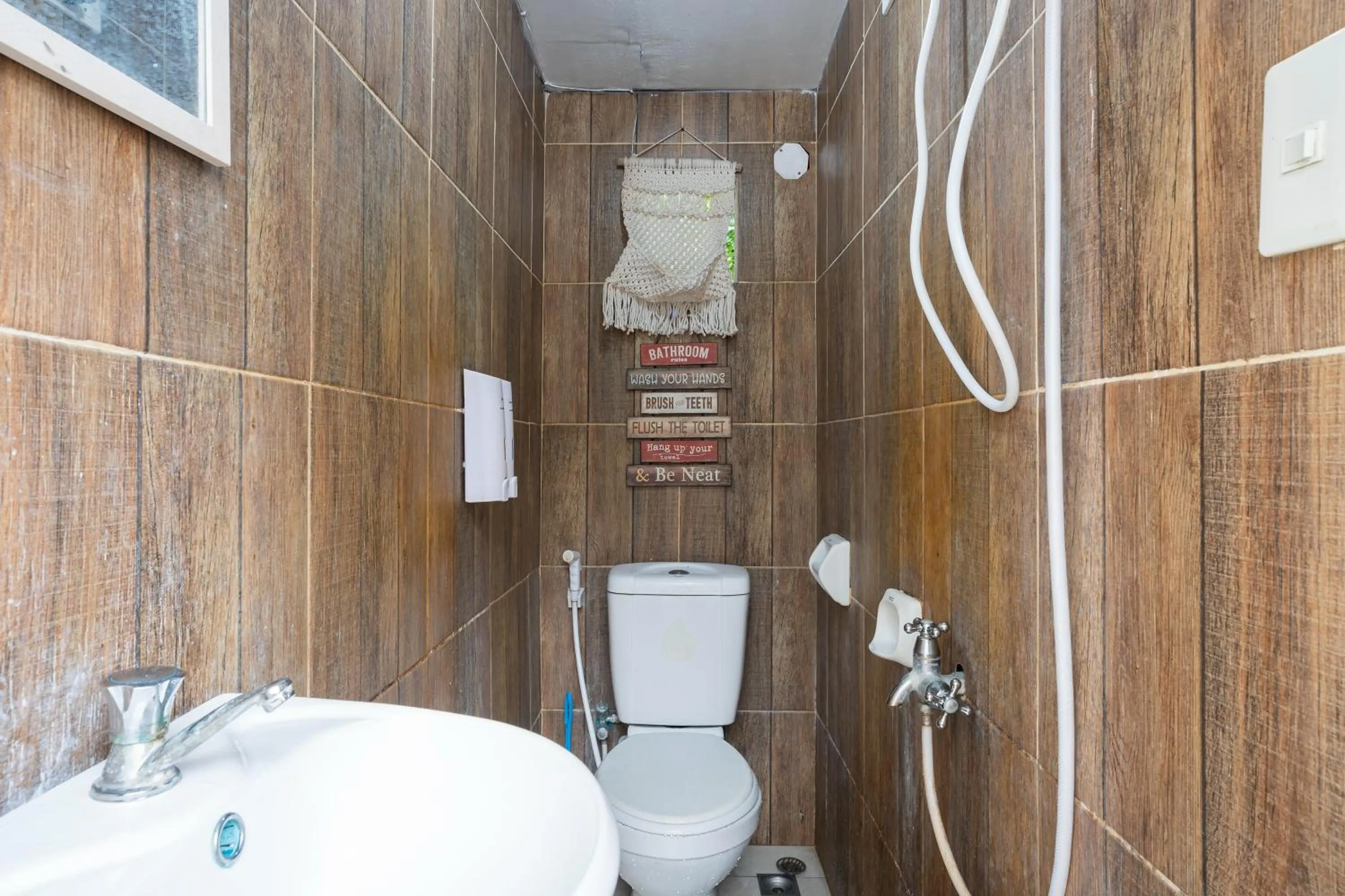 Bathroom in Costas De Liwa Bar & Beach Resort