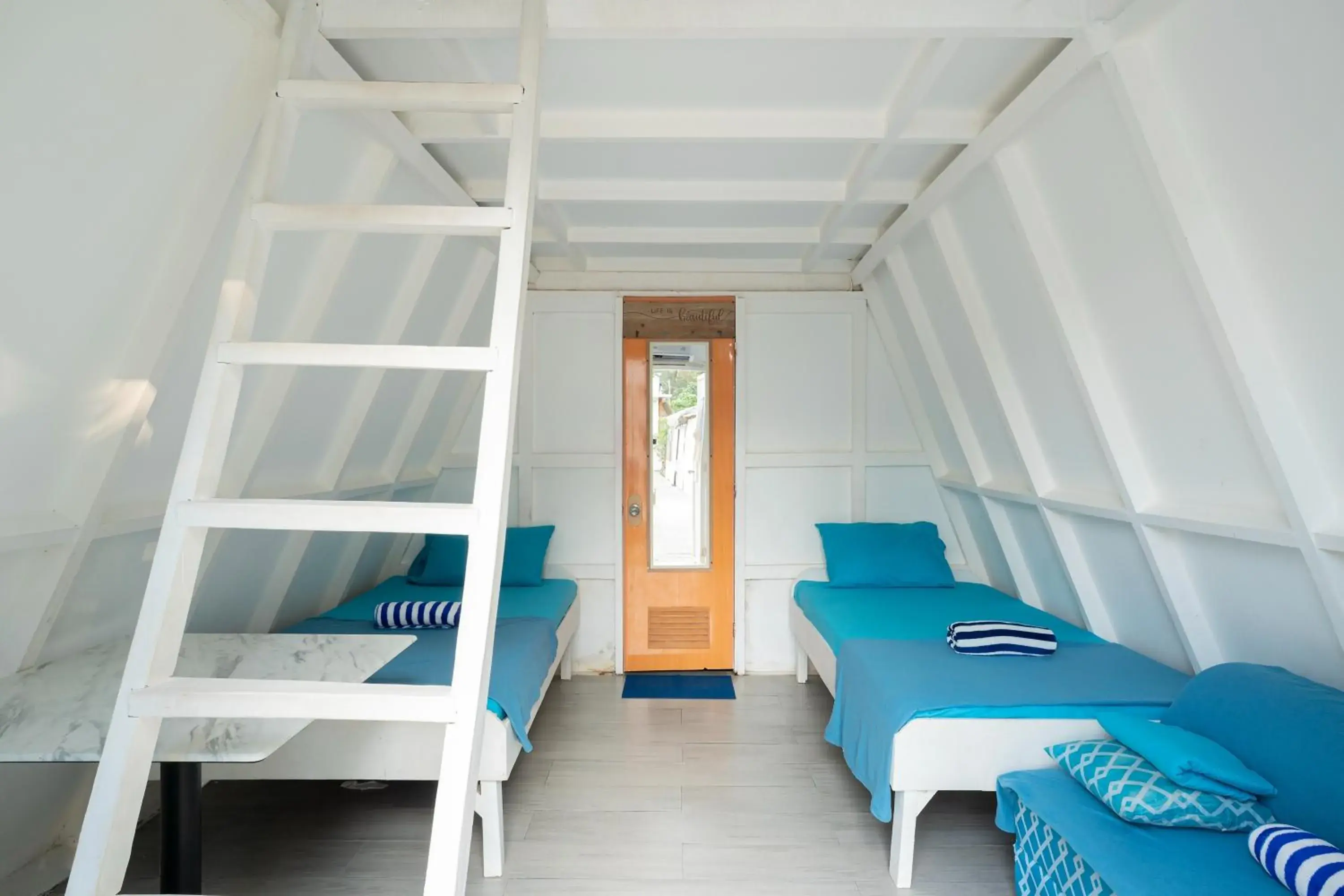 Bed in Costas De Liwa Bar & Beach Resort Bed in Costas De Liwa Bar & Beach Resort