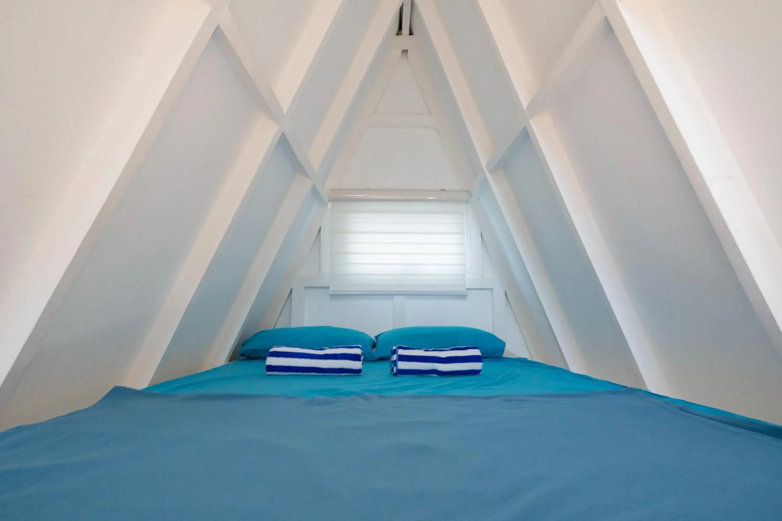 Bed in Costas De Liwa Bar & Beach Resort Bed in Costas De Liwa Bar & Beach Resort