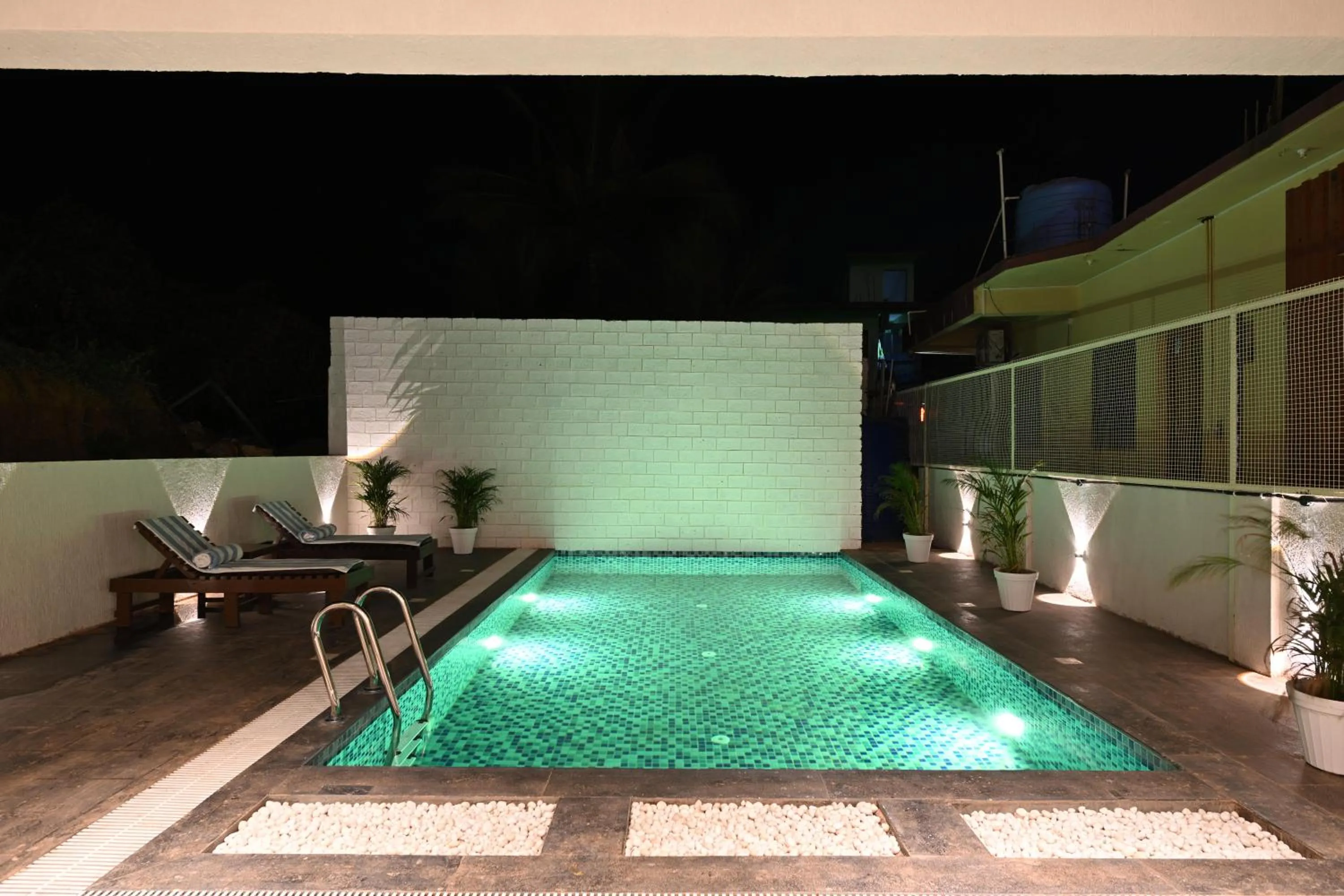 Swimming pool in Bedzzz Xclusiv Morjim, Goa By Leisure Hotels