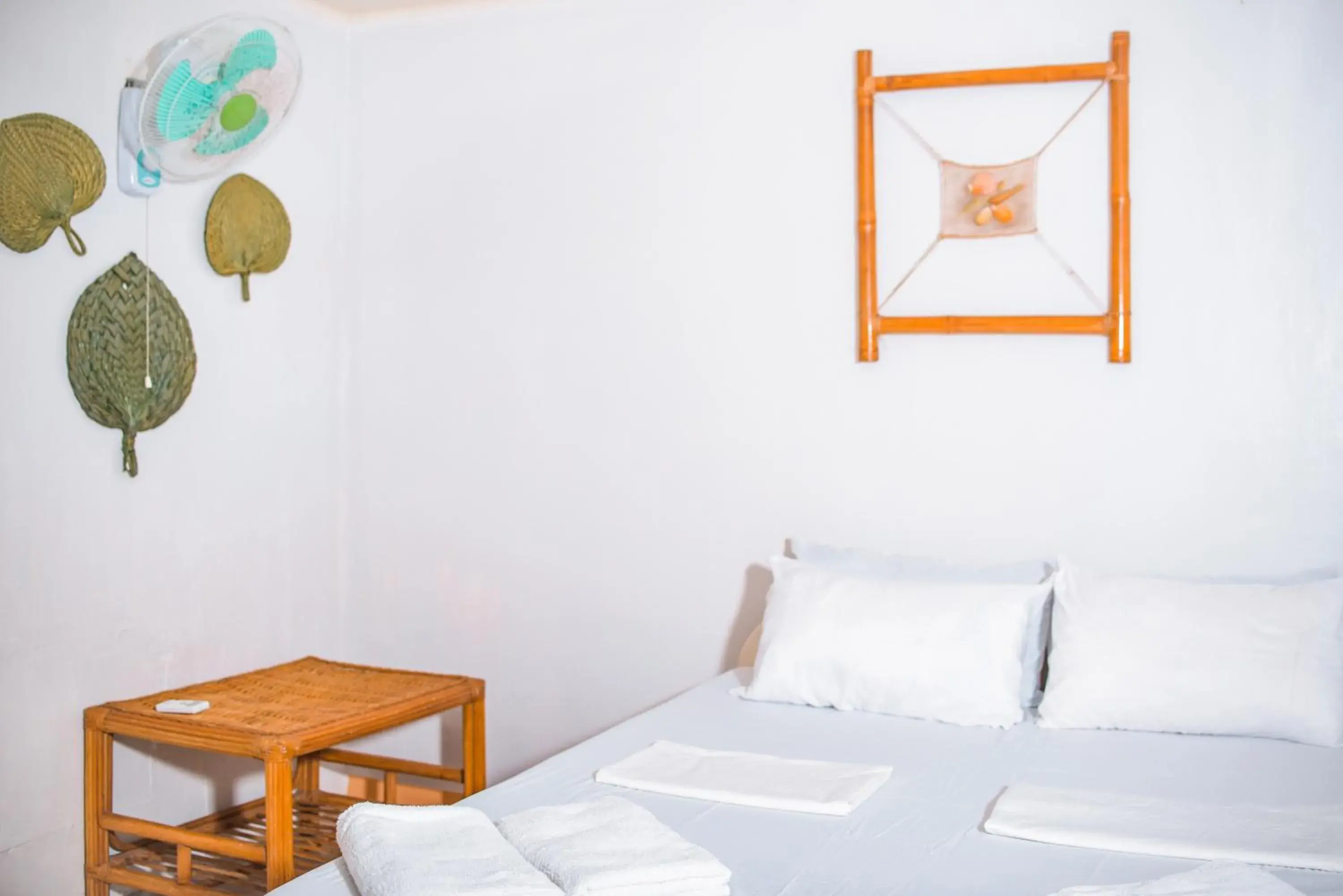 Bed in Whispering Palms Island Resort Bed in Whispering Palms Island Resort