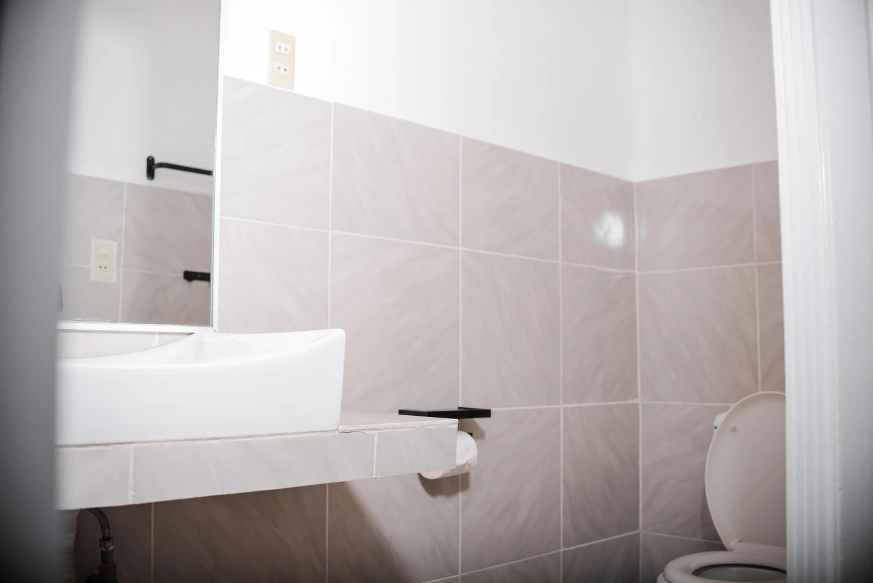 Bathroom in Whispering Palms Island Resort