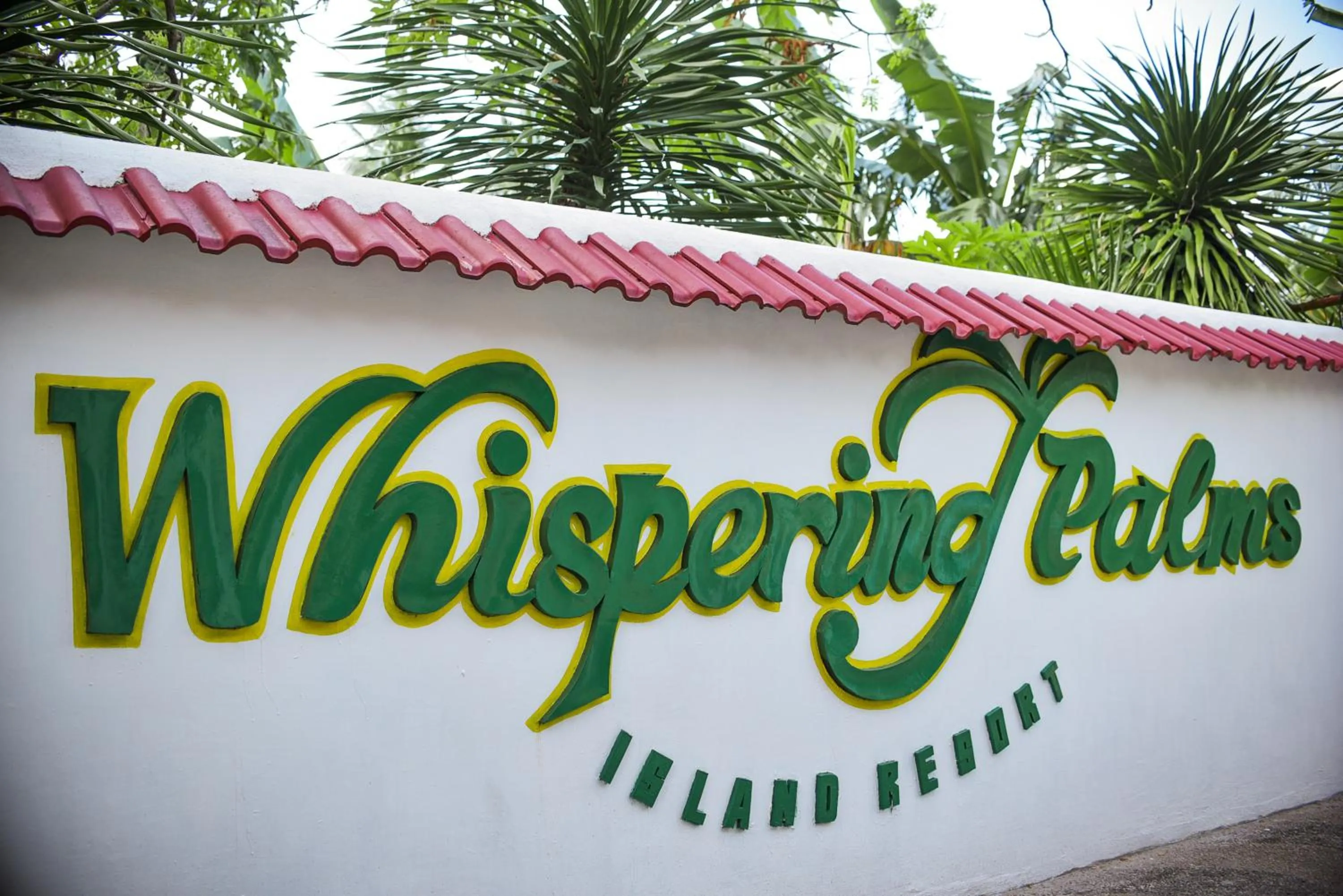 Property logo or sign in Whispering Palms Island Resort