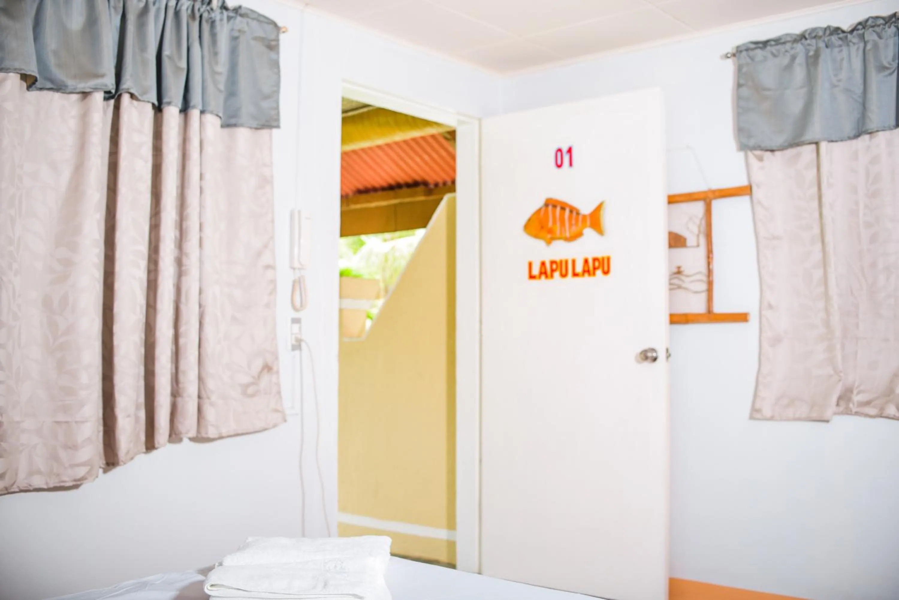 Property building, Bed in Whispering Palms Island Resort