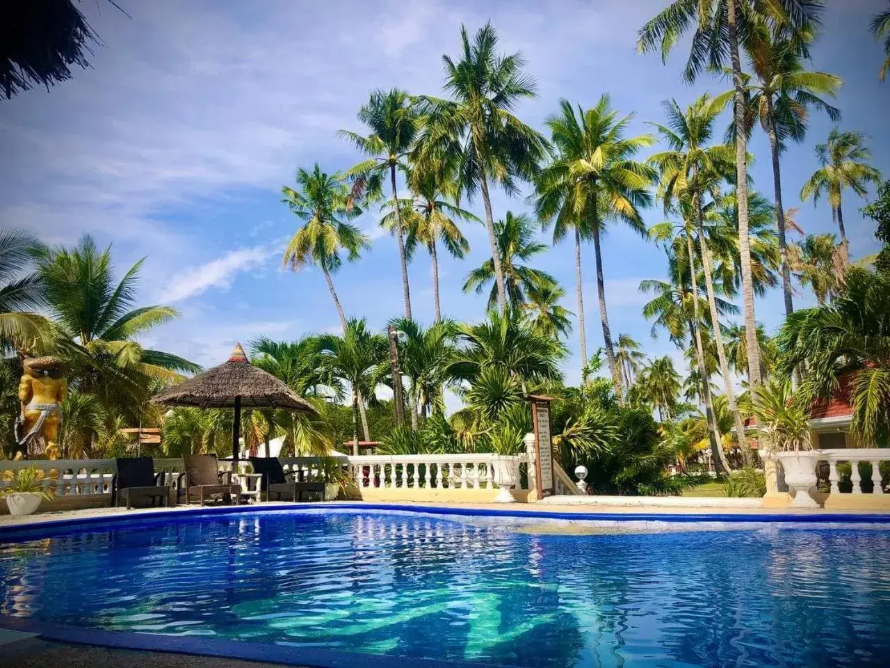 Swimming pool in Whispering Palms Island Resort Swimming pool in Whispering Palms Island Resort