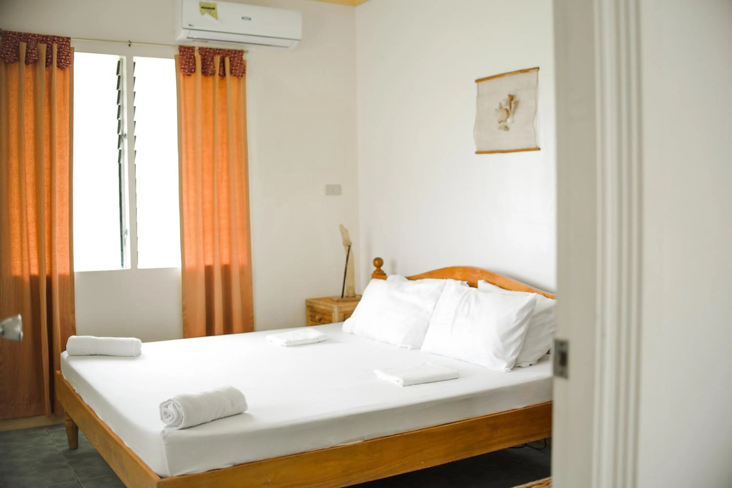 Bedroom, Bed in Whispering Palms Island Resort