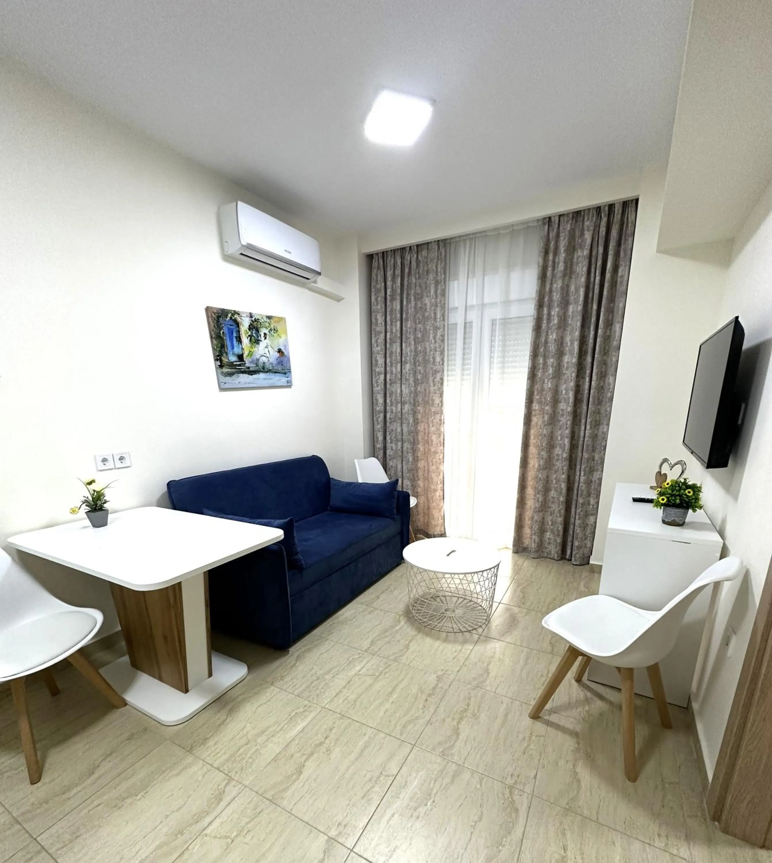 Living room, Bed in Navarino Luxe Suites