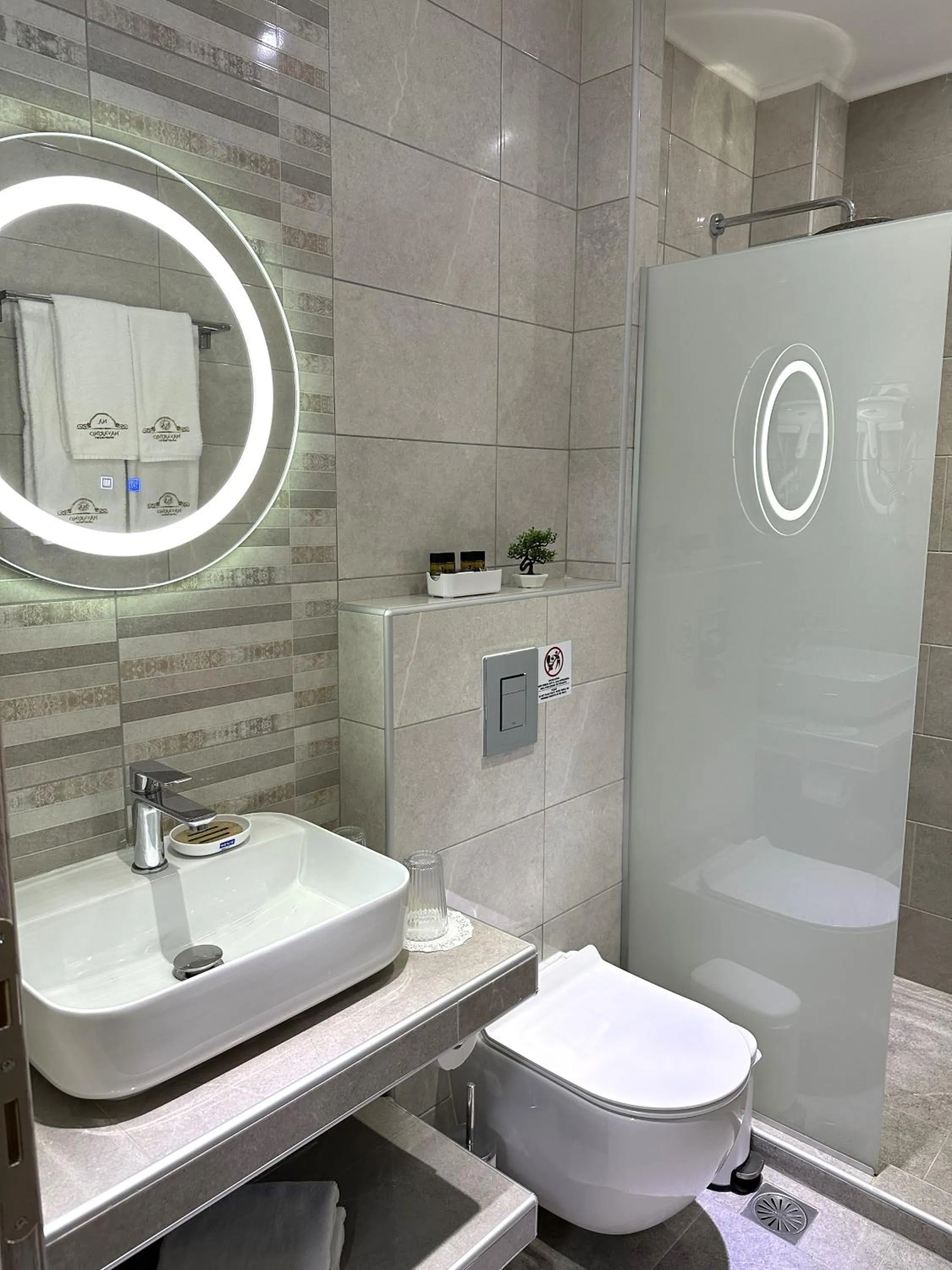 Toilet in Navarino Luxe Suites