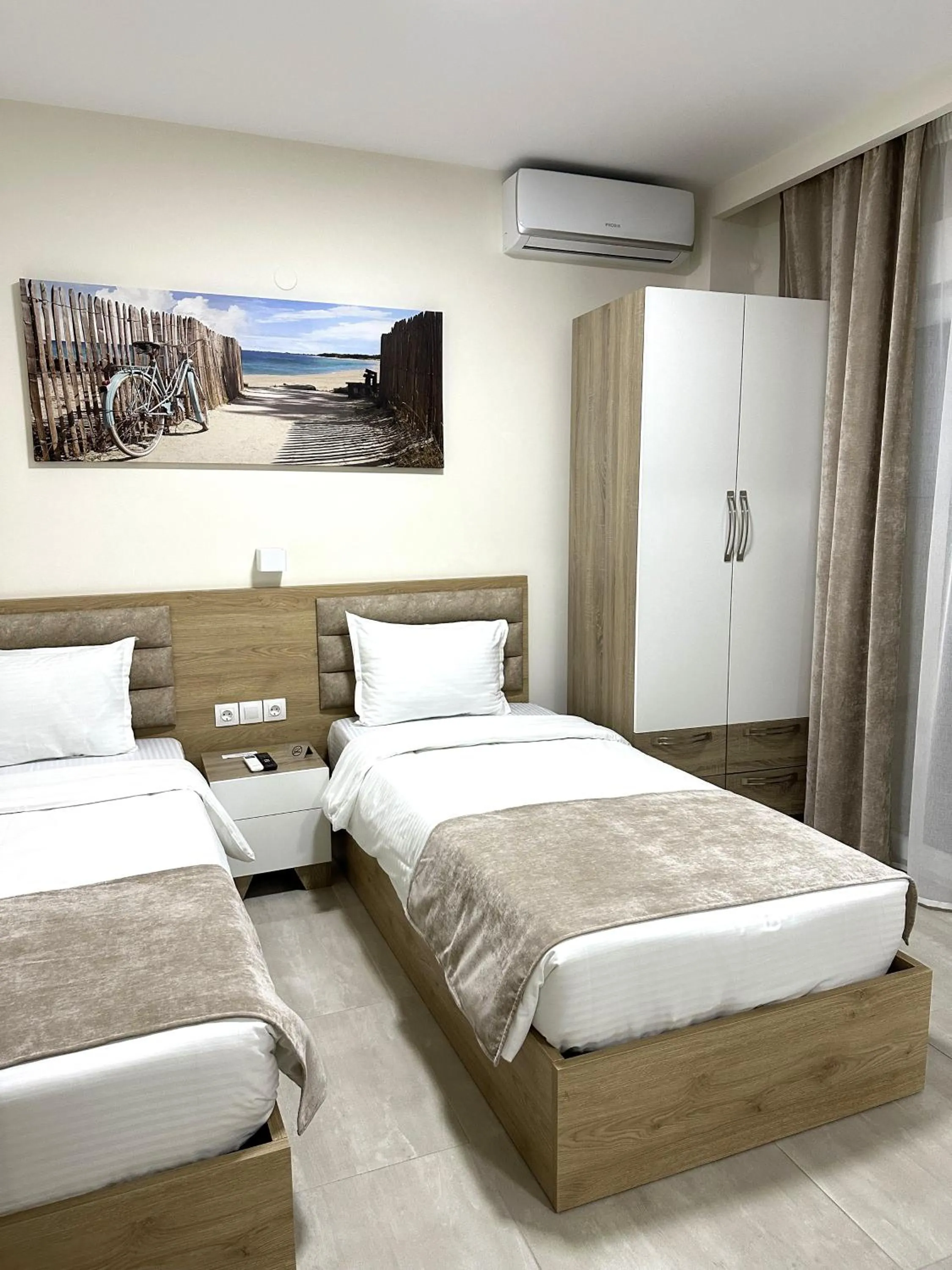 Bed in Navarino Luxe Suites