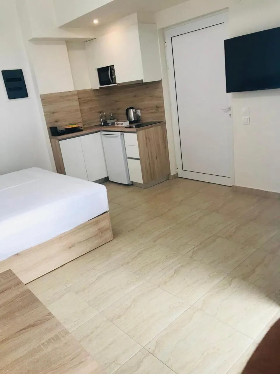 Kitchen or kitchenette in Navarino Luxe Suites