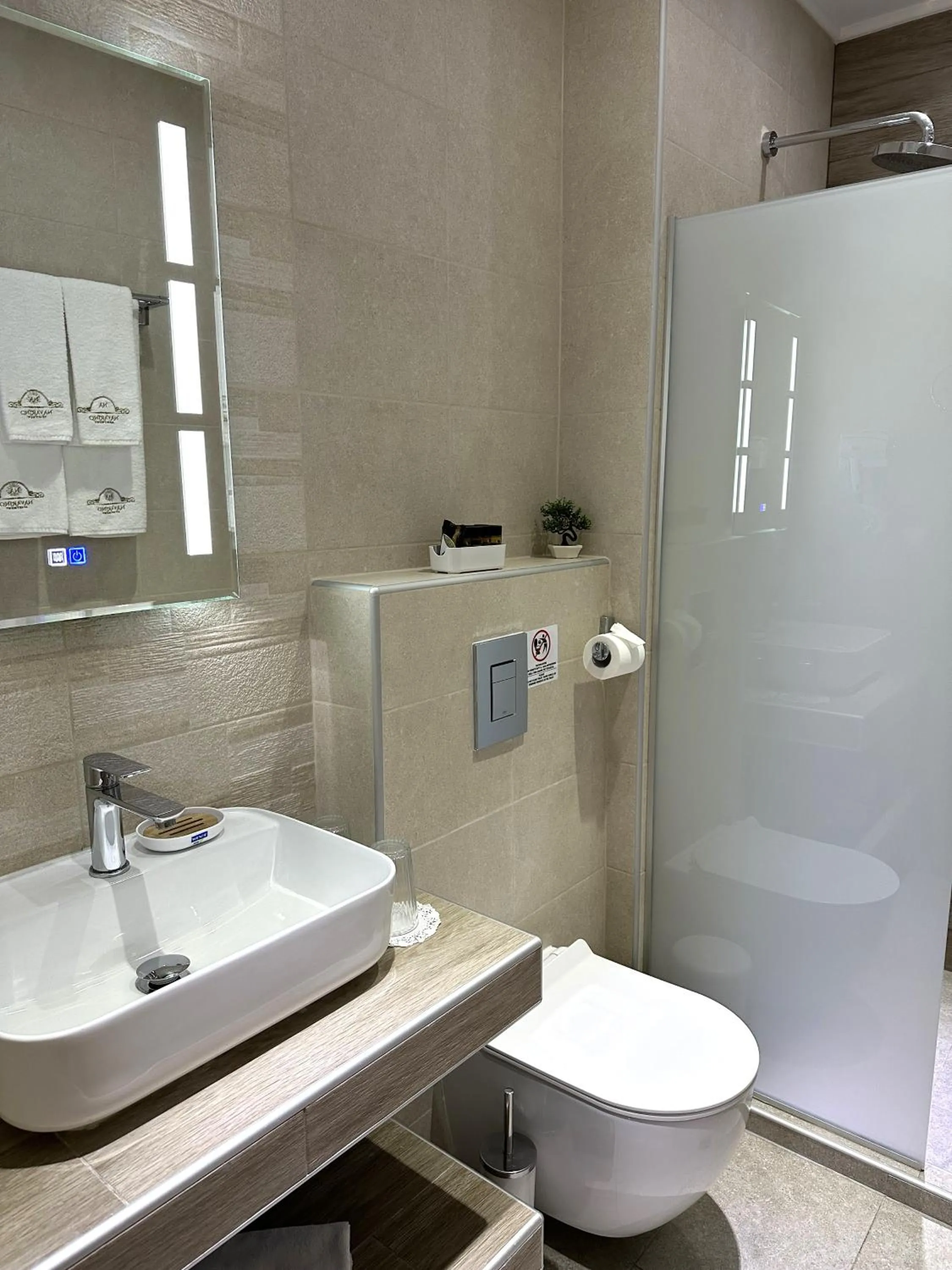 Toilet in Navarino Luxe Suites