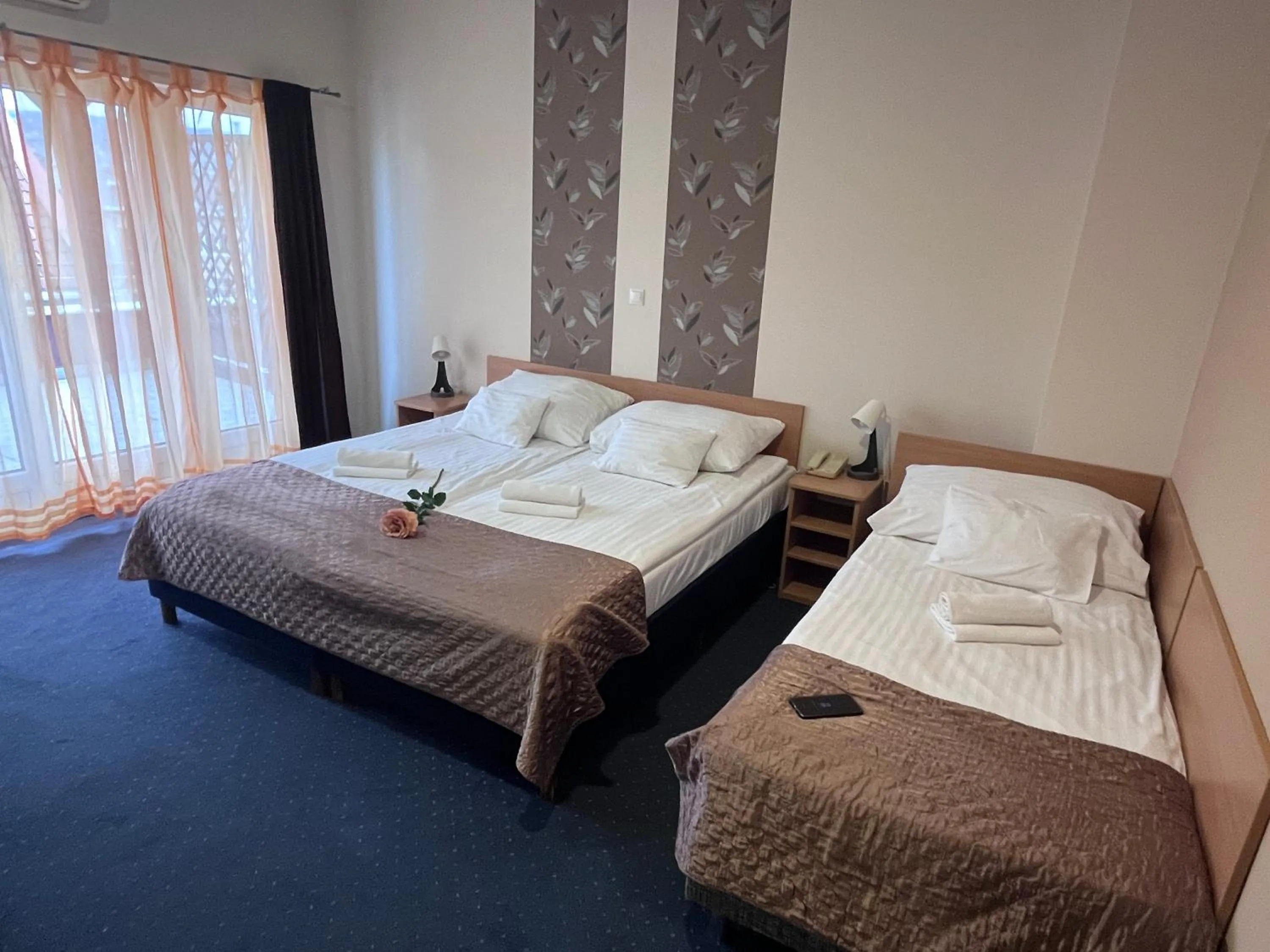 Bed in Hotel Rose City