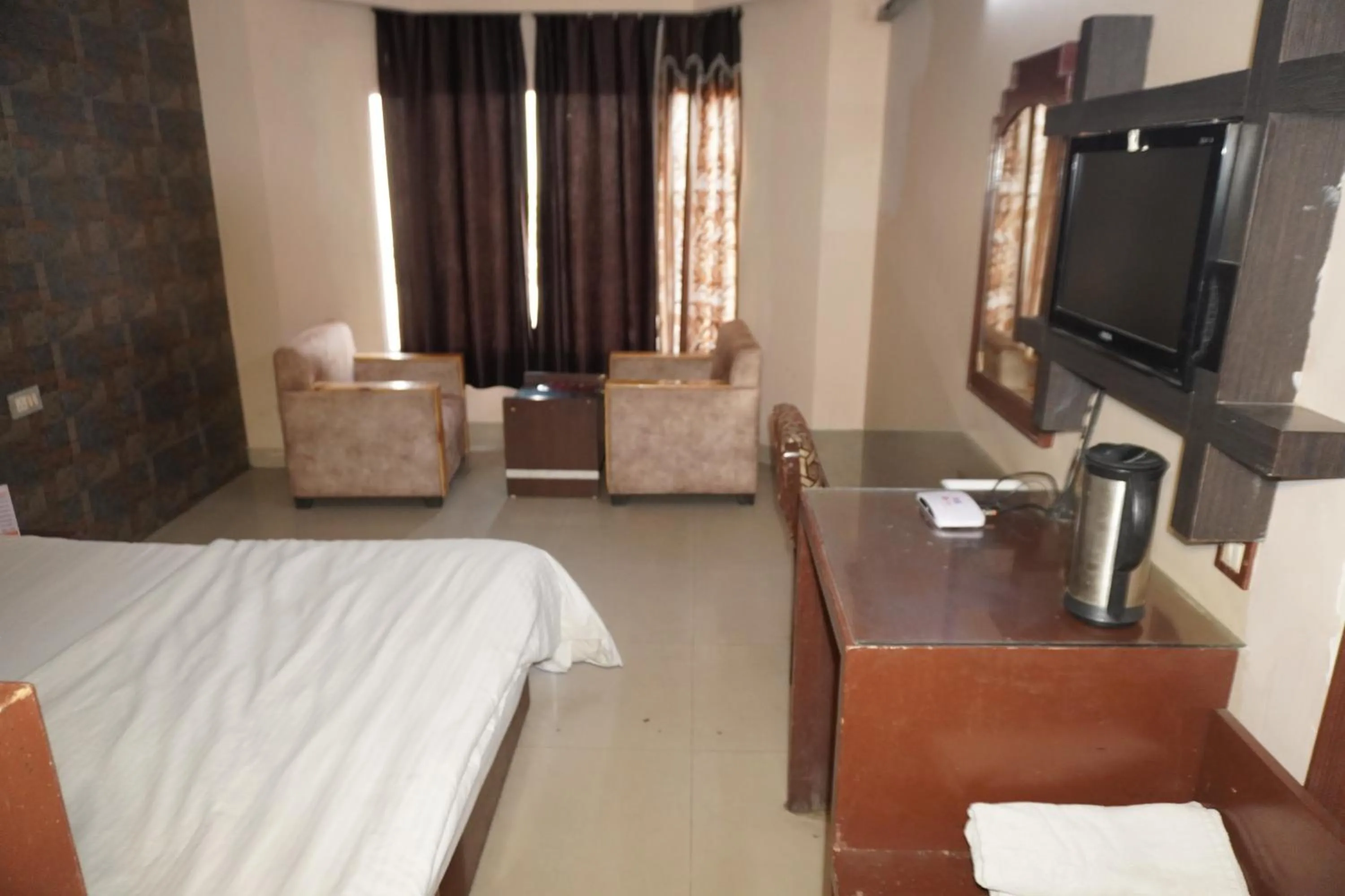 Bed in Hotel Maya international