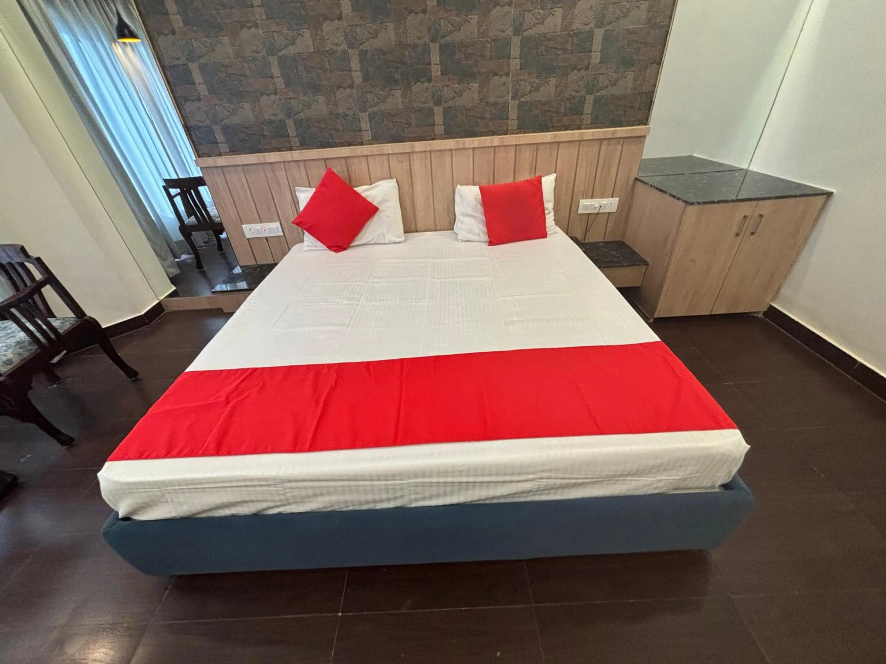 Bed in Hotel Maya international