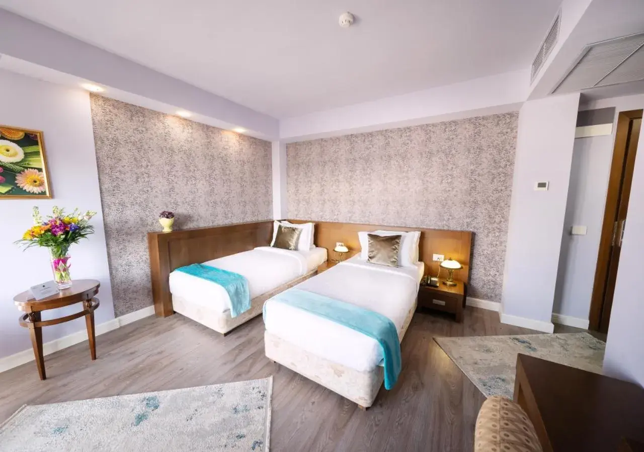 Bed in Phoenicia Comfort Hotel Bed in Phoenicia Comfort Hotel