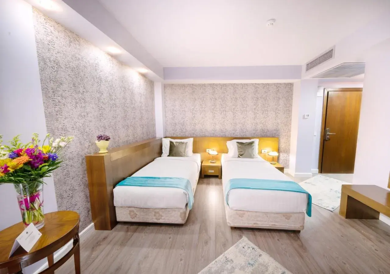 Bed in Phoenicia Comfort Hotel Bed in Phoenicia Comfort Hotel