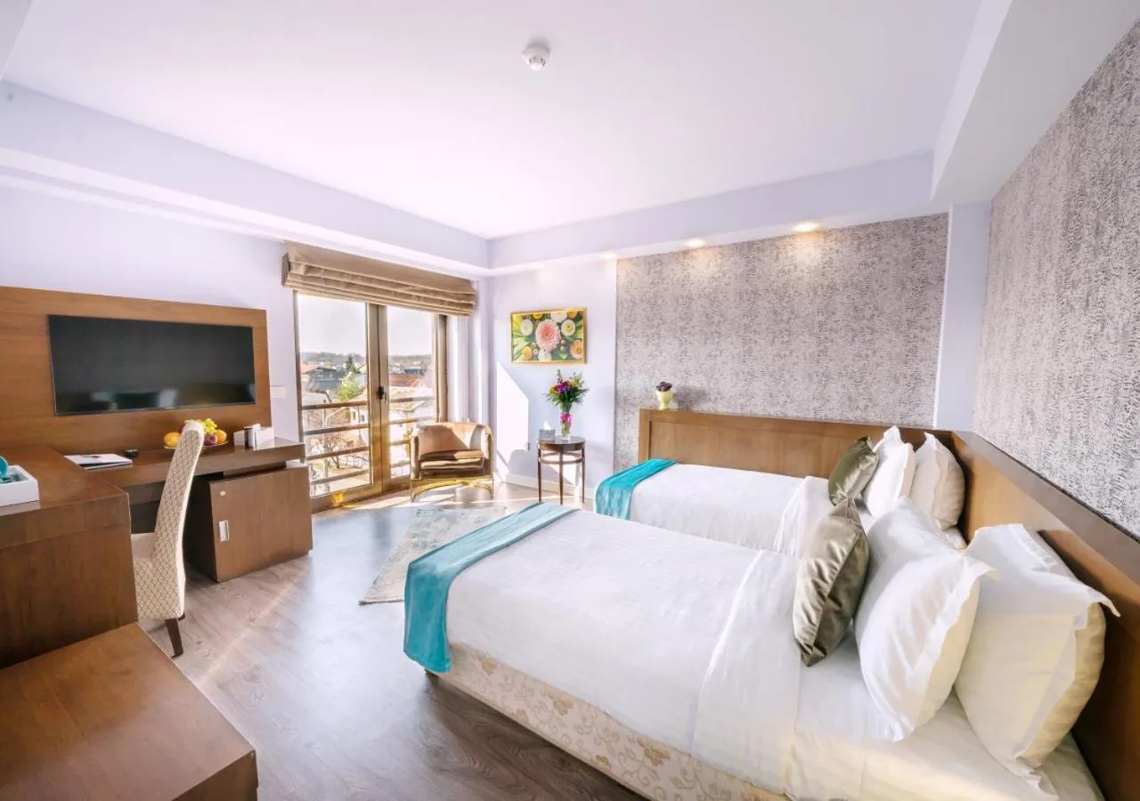 Bed in Phoenicia Comfort Hotel