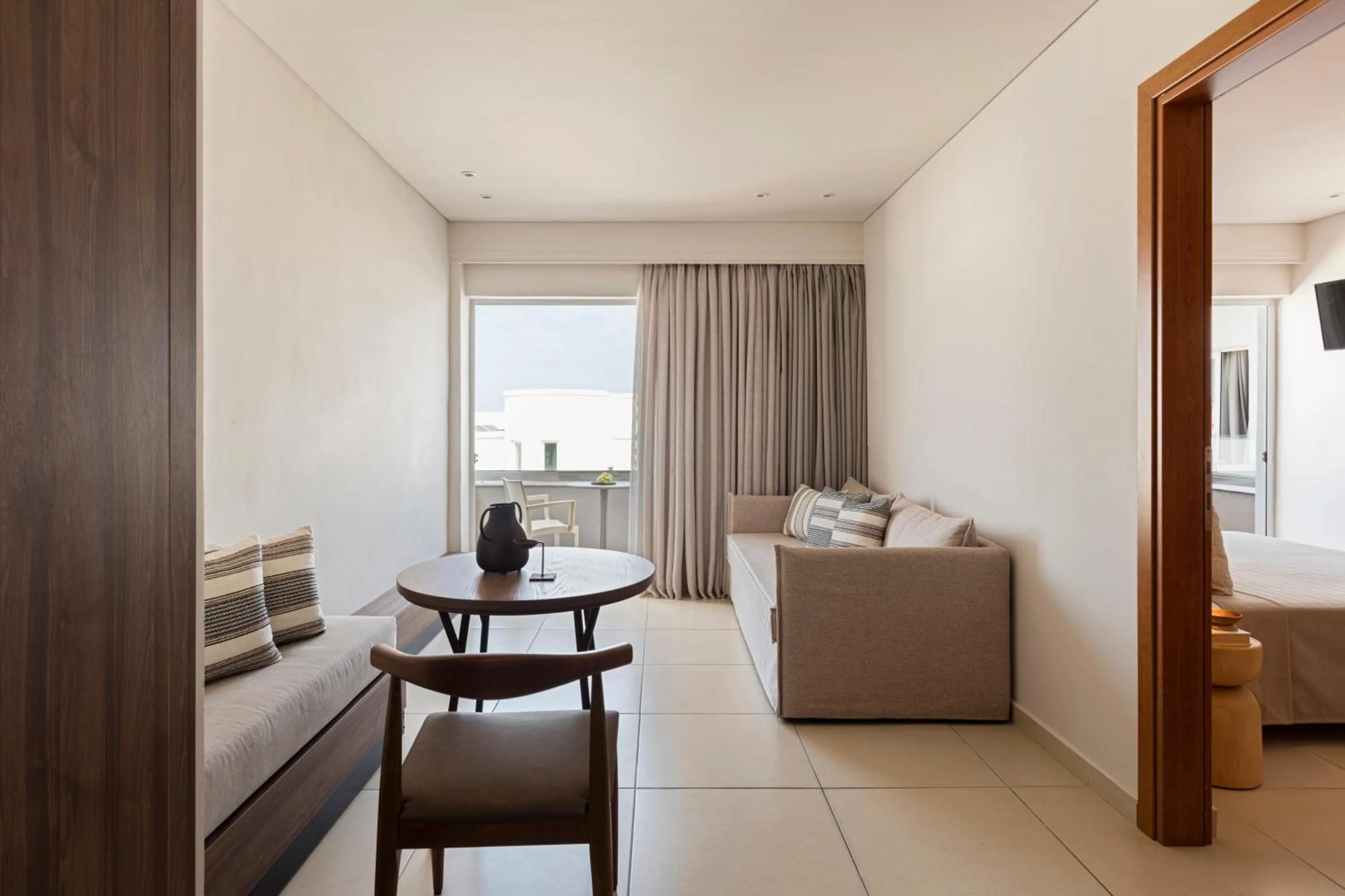 Seating area, Bed in Anastasia Hotel