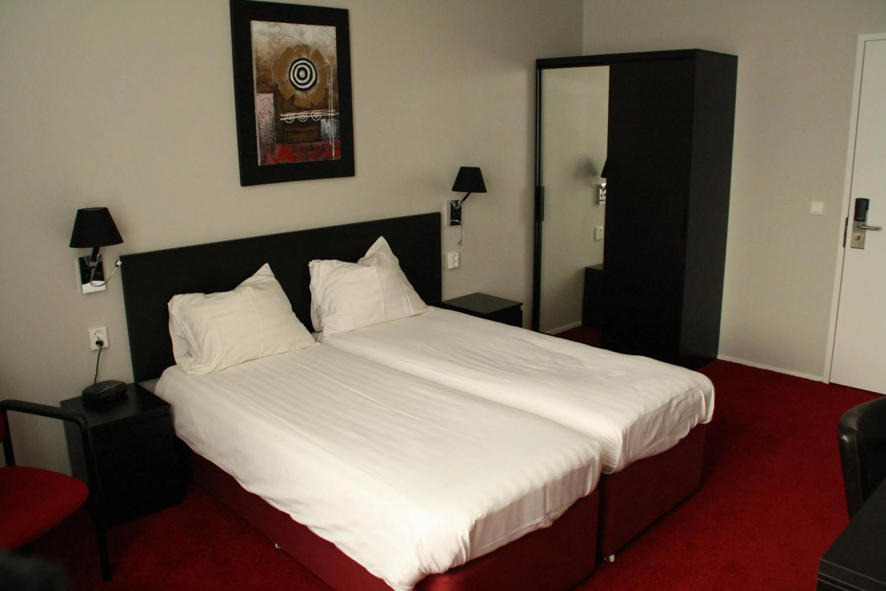 Bed in Stadshotel Ootmarsum