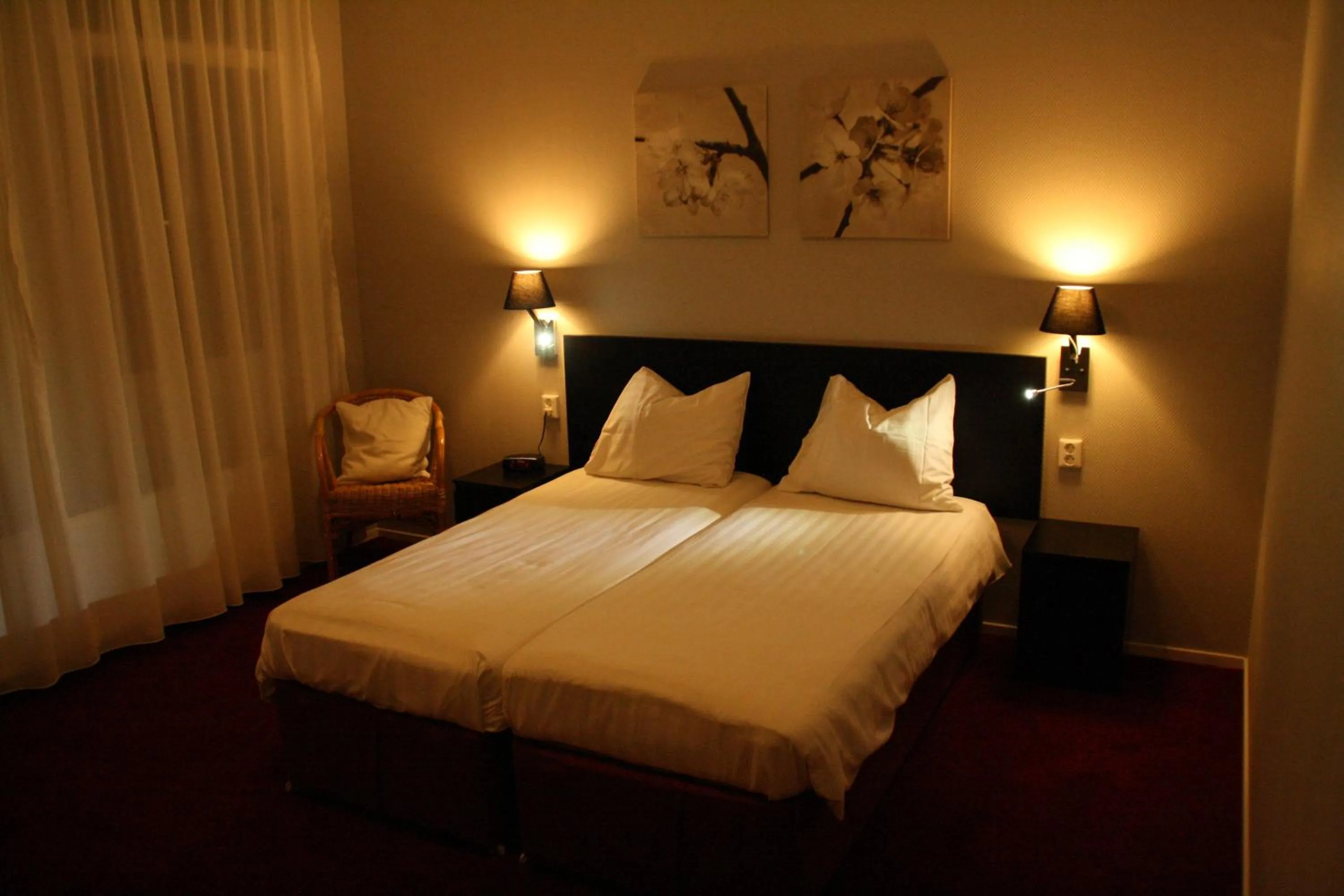 Bed in Stadshotel Ootmarsum