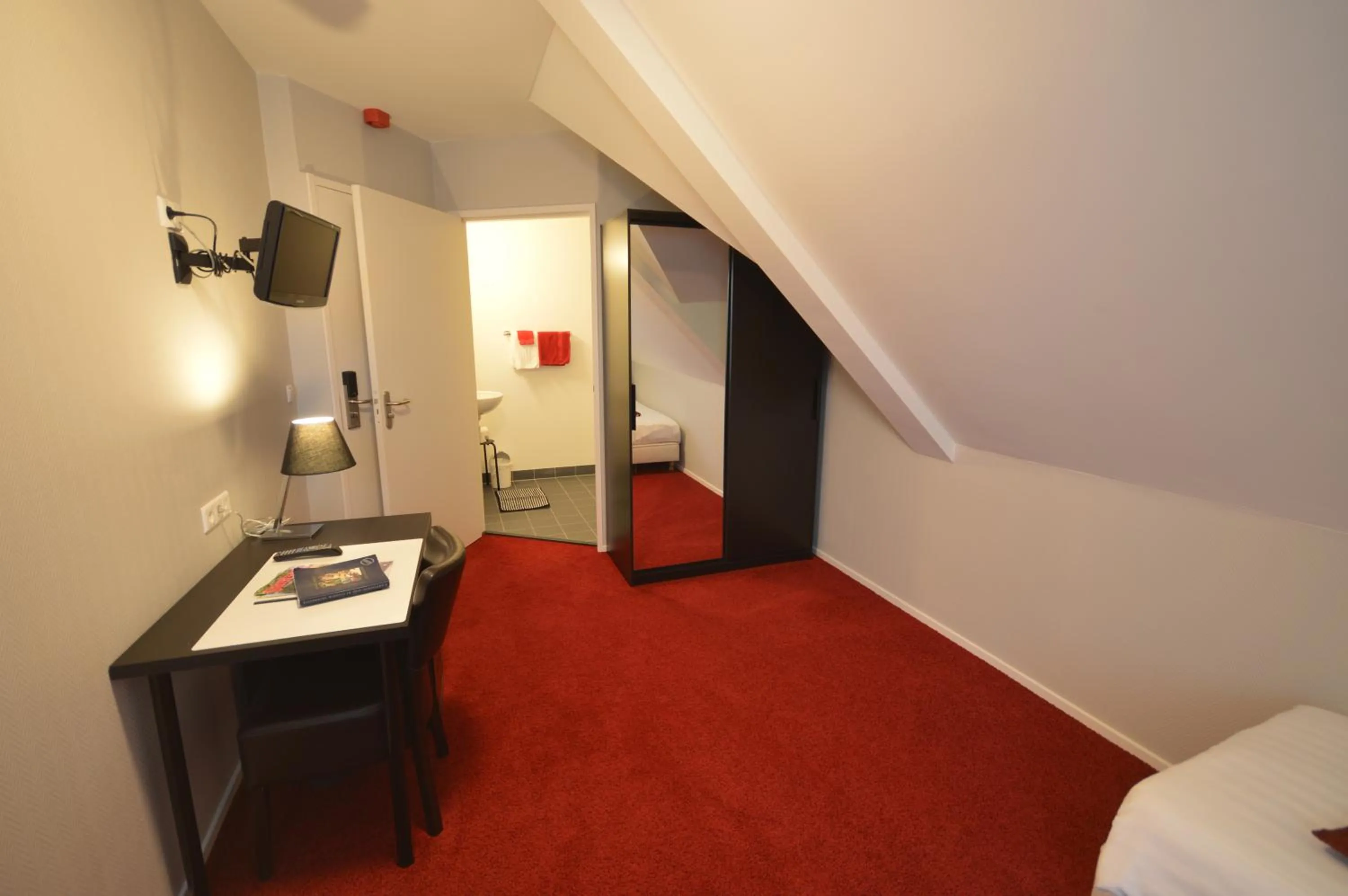 Bed in Stadshotel Ootmarsum