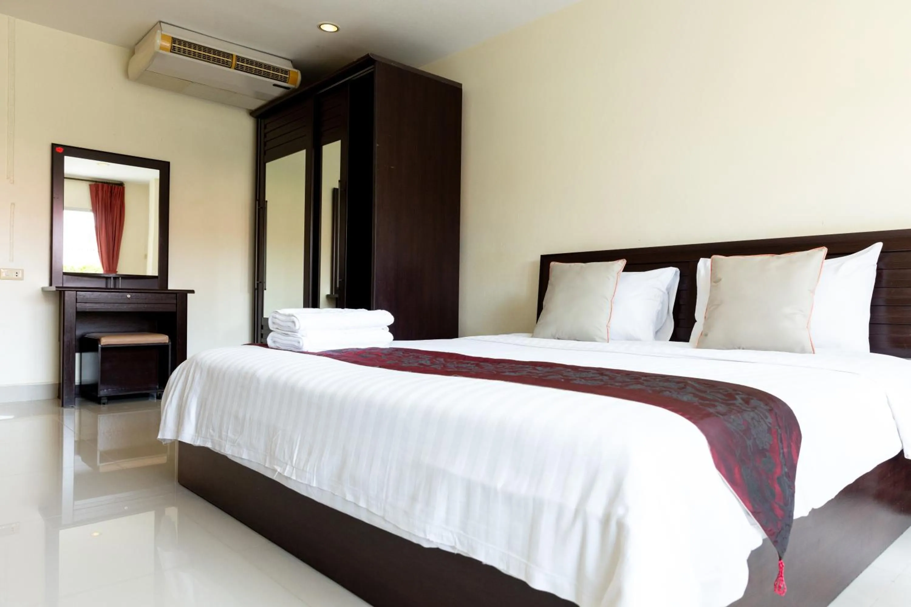 Bed in Kiatthada Resort