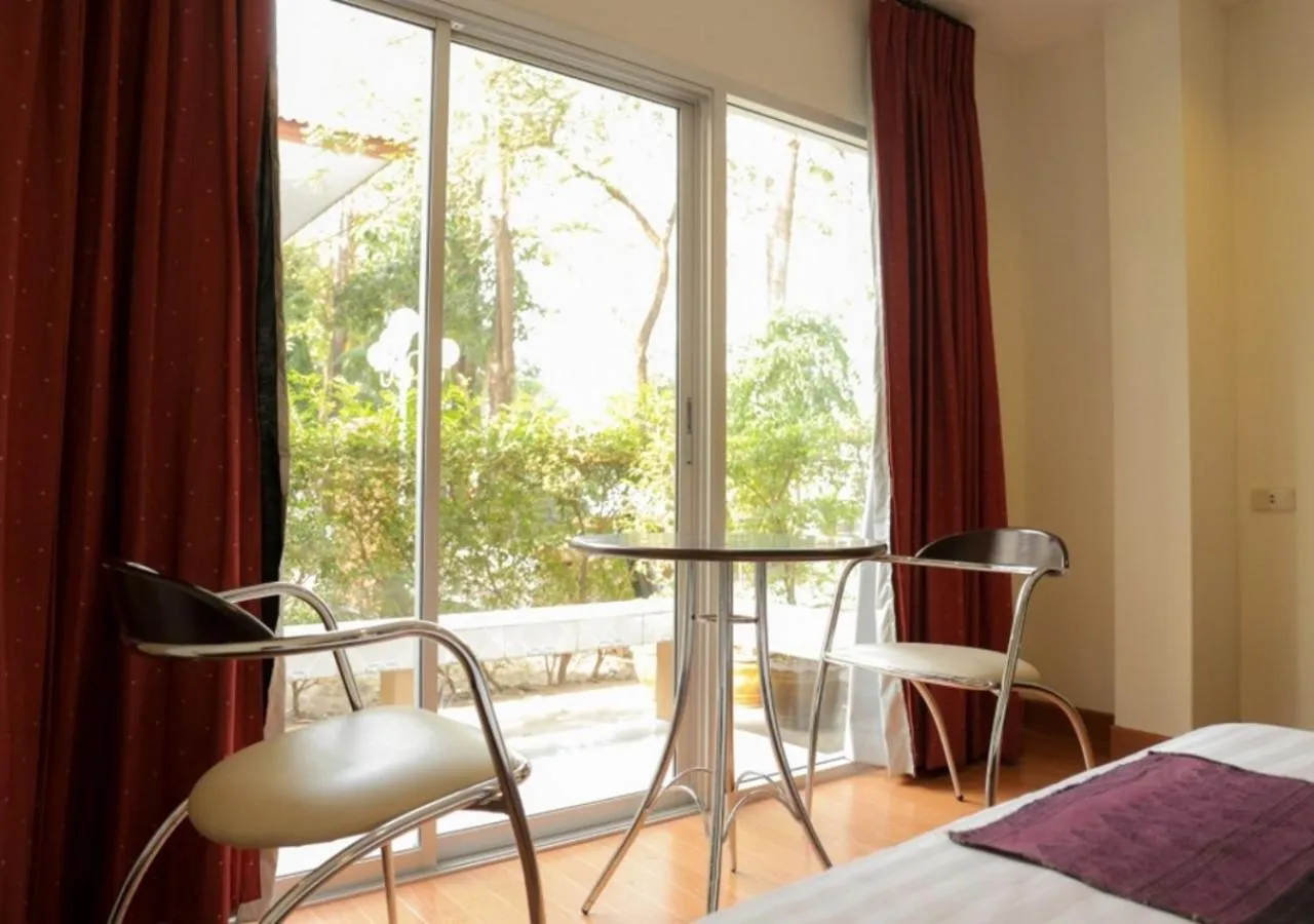 Seating area, Bed in Kiatthada Resort