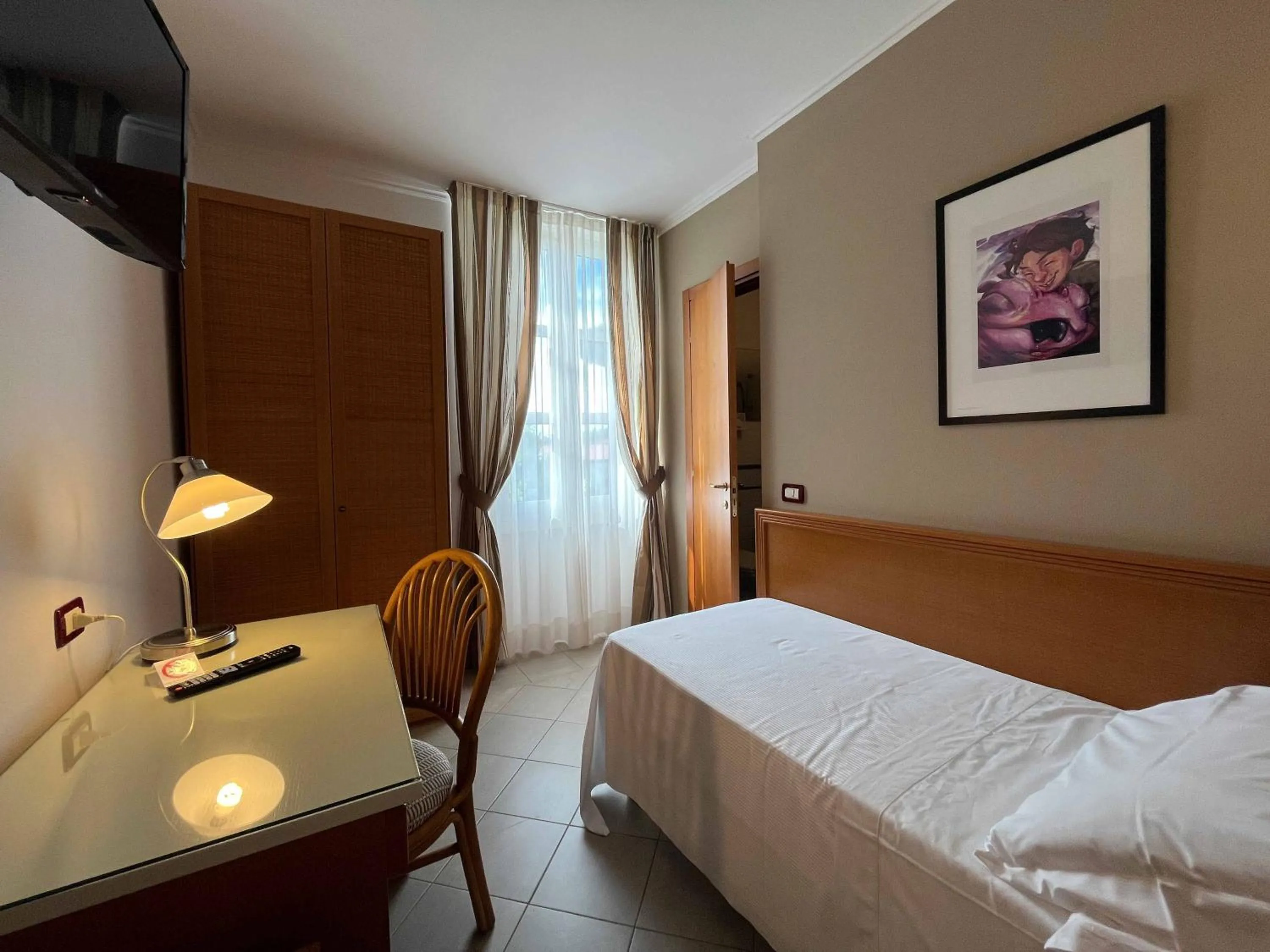 Photo of the whole room, Bed in Hotel Regina