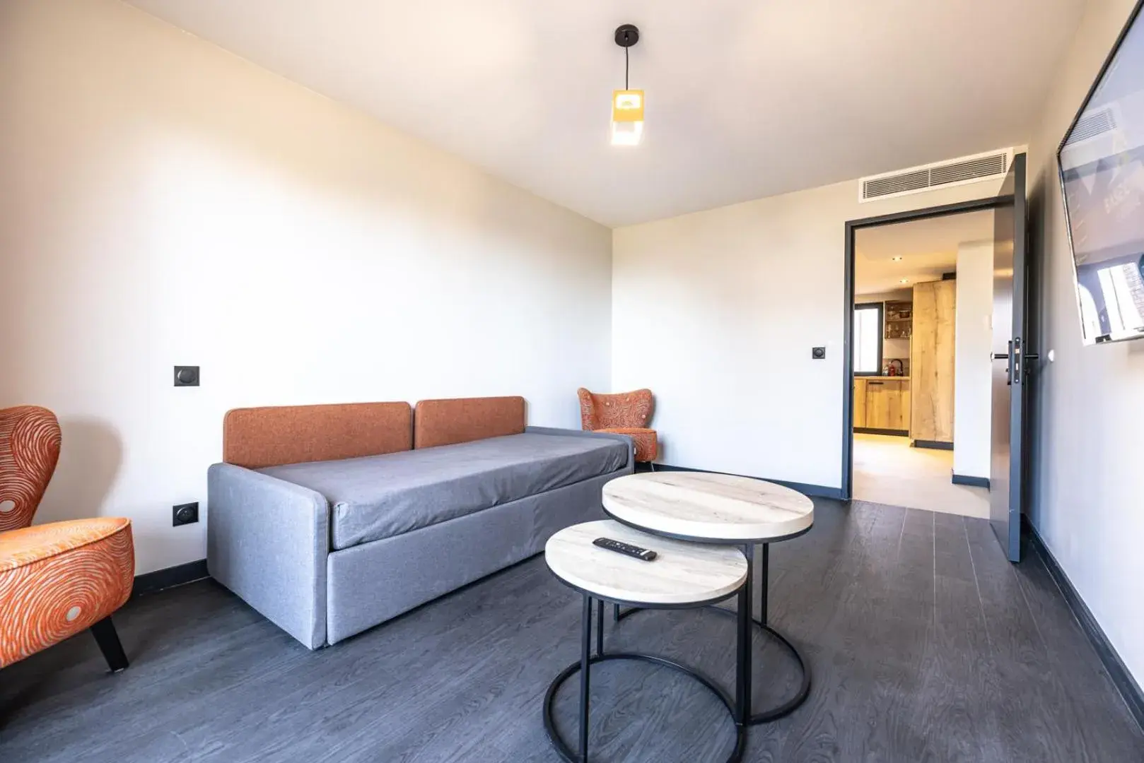 Seating area in Hotel Base Camp Lodge - Albertville Seating area in Hotel Base Camp Lodge - Albertville