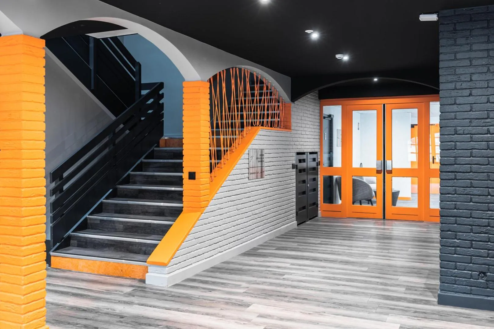 Lobby or reception in Hotel Base Camp Lodge - Albertville